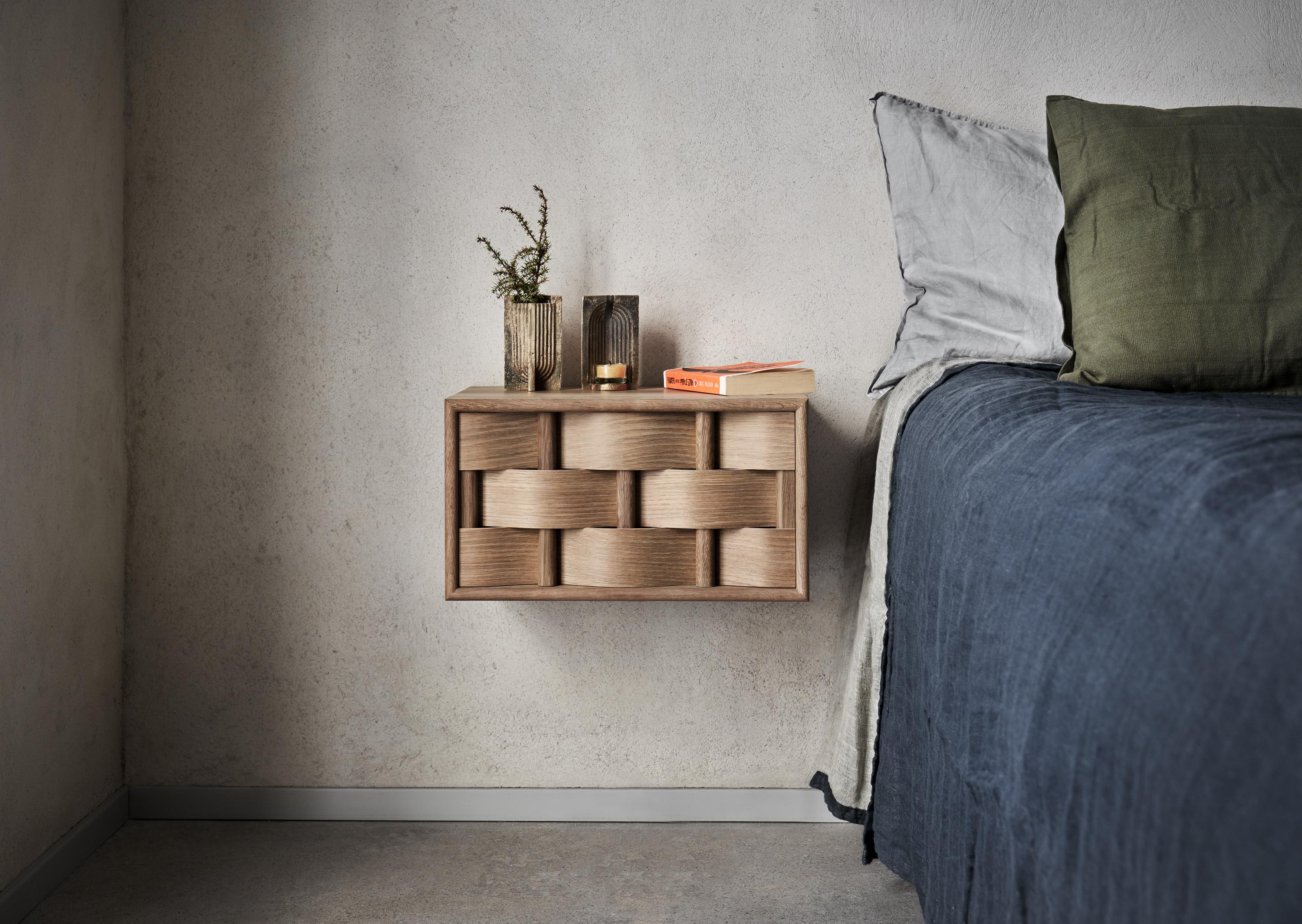 Weave bedside table 
Bedside table, made of solid birch wood and laminated birchveneér or solid oak wood and oak veneér. Modern yet classic, bold yet modest the bedside serves as a great example of Scandinavian contemporary design. Designed by