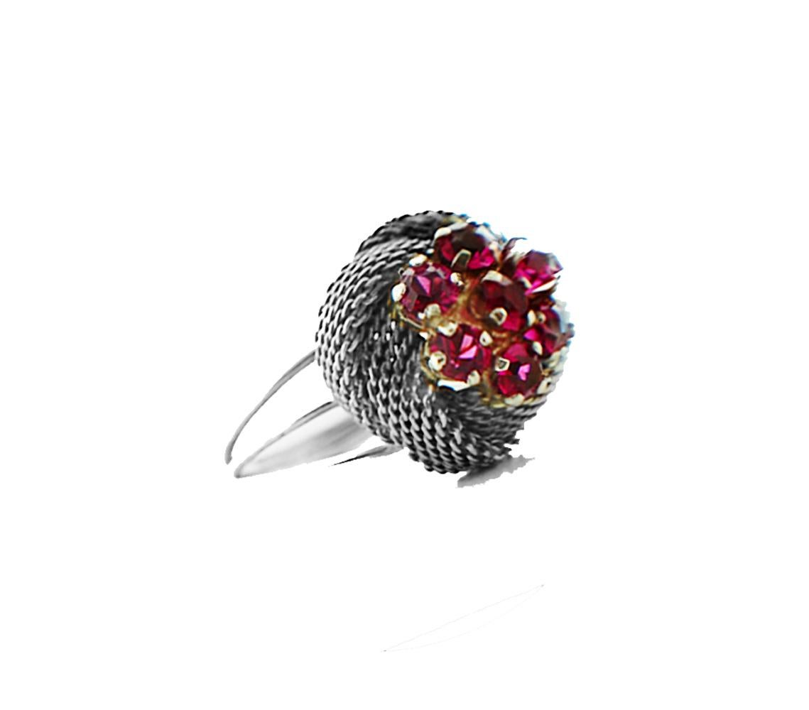 Weaved Mesh Sterling Red Stone Cluster Ring 
Very pretty pink colored stones are set in this CIrca 1950's ring.
Custom weaved mesh supports the cluster of stones.

Ring measures .65 inches in diameter and height is .57 inch.
Size 7.5
5.53 Grams of