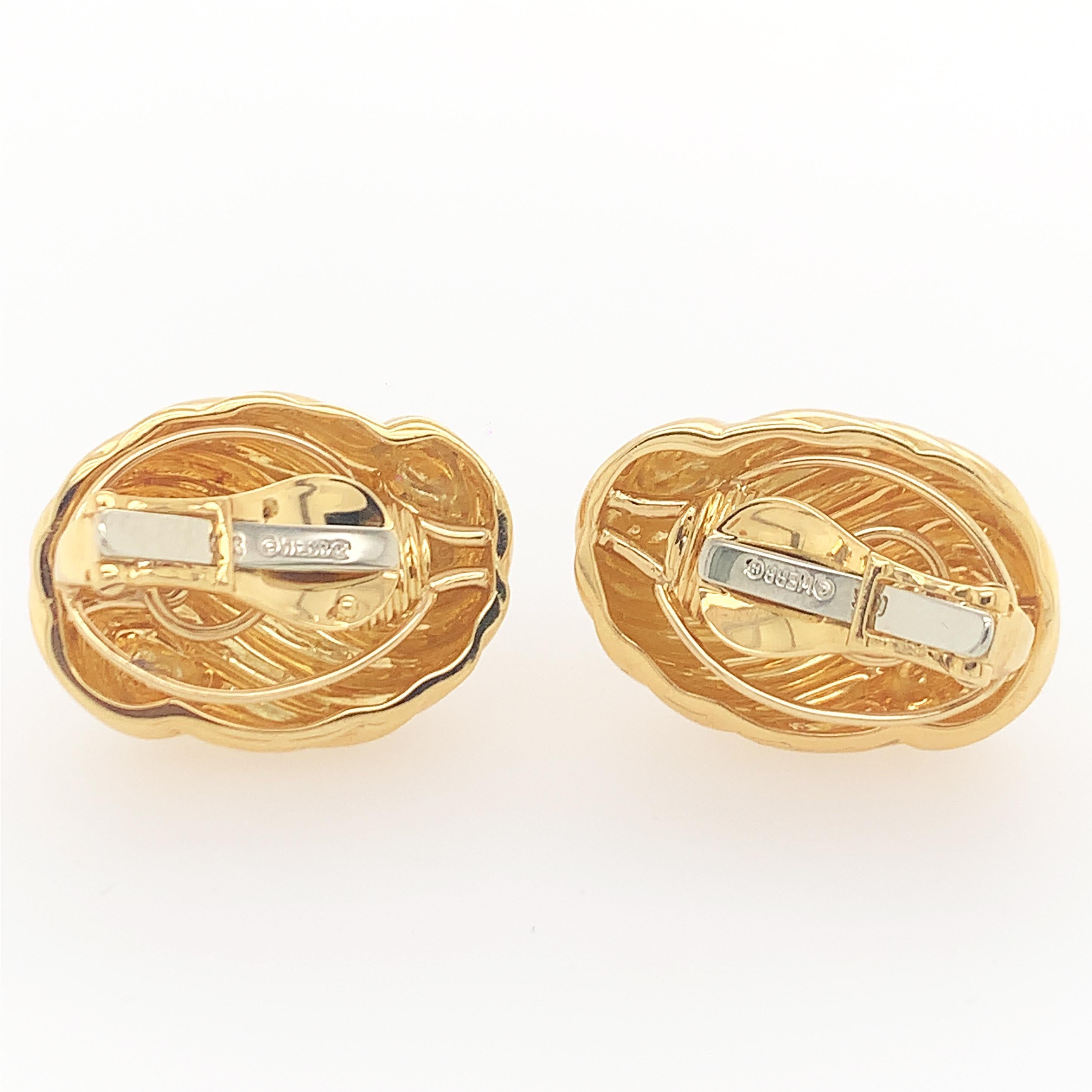 18K Y/gold earclips, stamps Webb 18K measures 1 1/8 x 3/4 inch, weight 17.1 dwt.