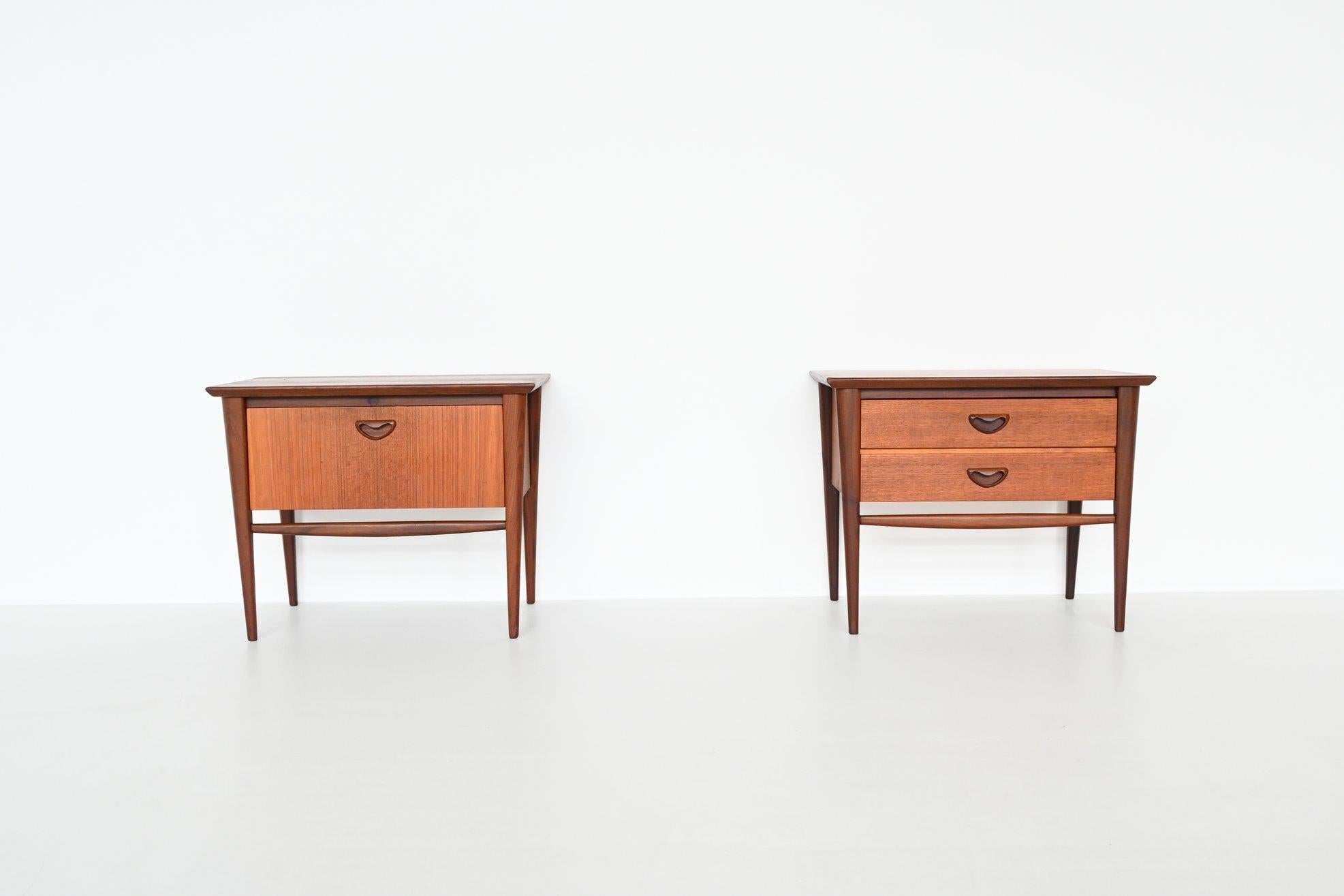Beautiful shaped pair of nightstands designed by Louis van Teeffelen and manufactured by Webe Meubelen, The Netherlands 1960. They are made of solid and veneered teak wood. These high quality nightstands have very nice details like the well-crafted