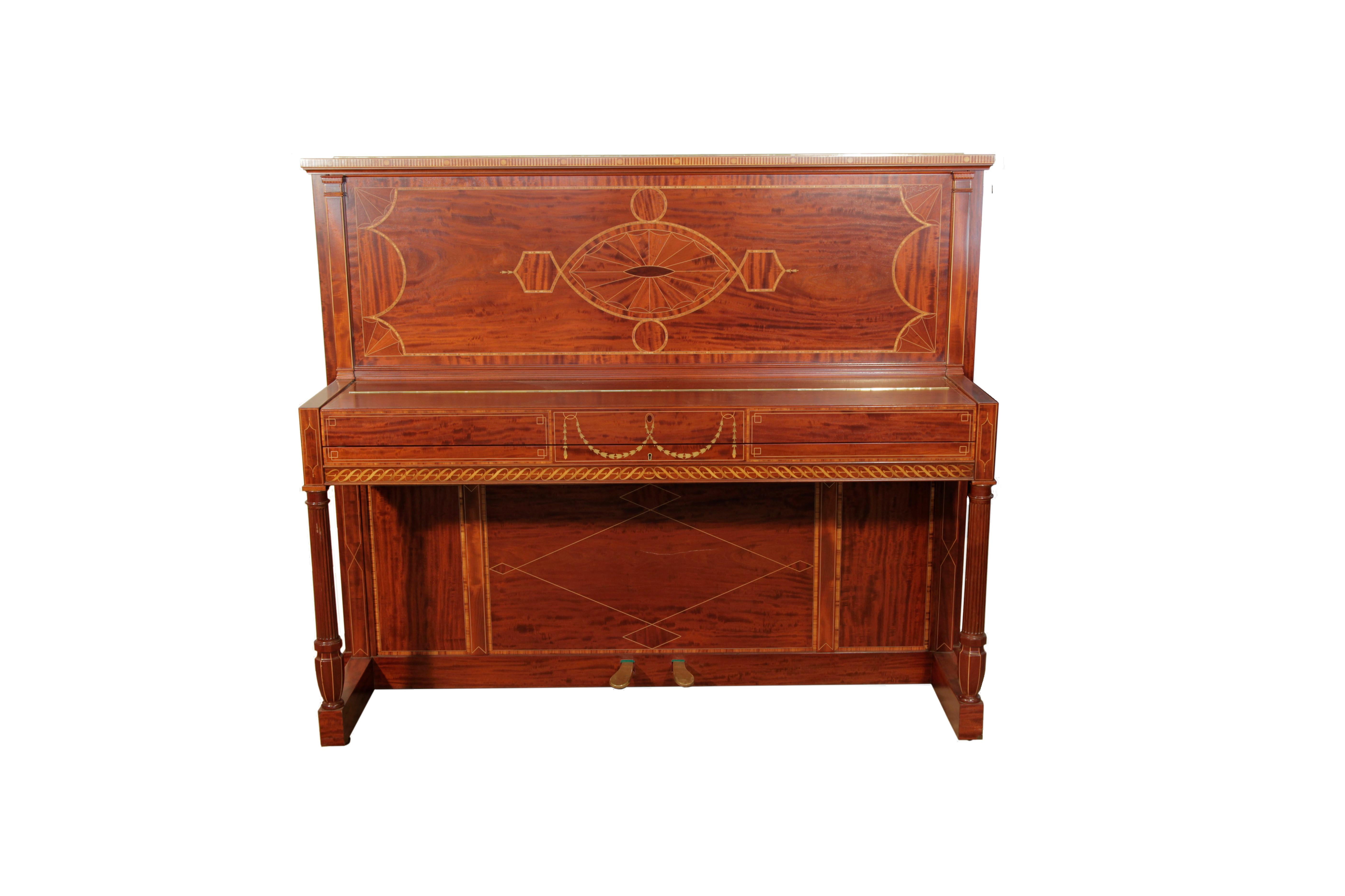 A 1912, Weber upright piano for sale with a figured, mahogany case. Piano has fluted Doric style piano legs with an urn shaped pedestal.
Entire cabinet is inlaid in a variety of woods with stylised Neoclassical motifs and geometric forms. 
The