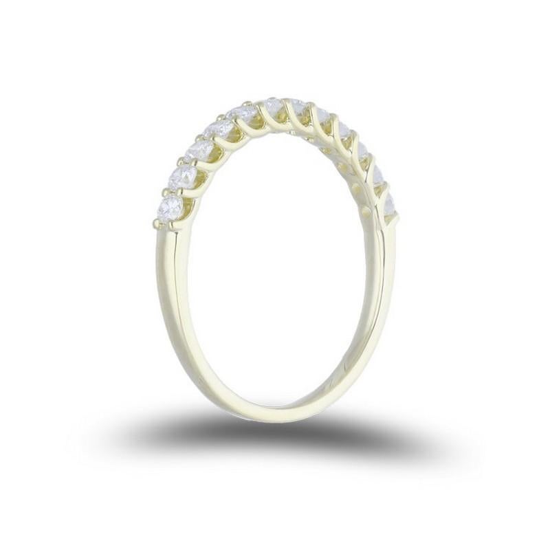 1981 Classic Collection Half Eternity Wedding Band Ring: 0.5 Carat Diamonds in 14k Gold

Diamond Total Carat Weight: This exquisite 1981 Classic Collection half eternity wedding band ring features a total carat weight of 0.5 carats, showcasing 12
