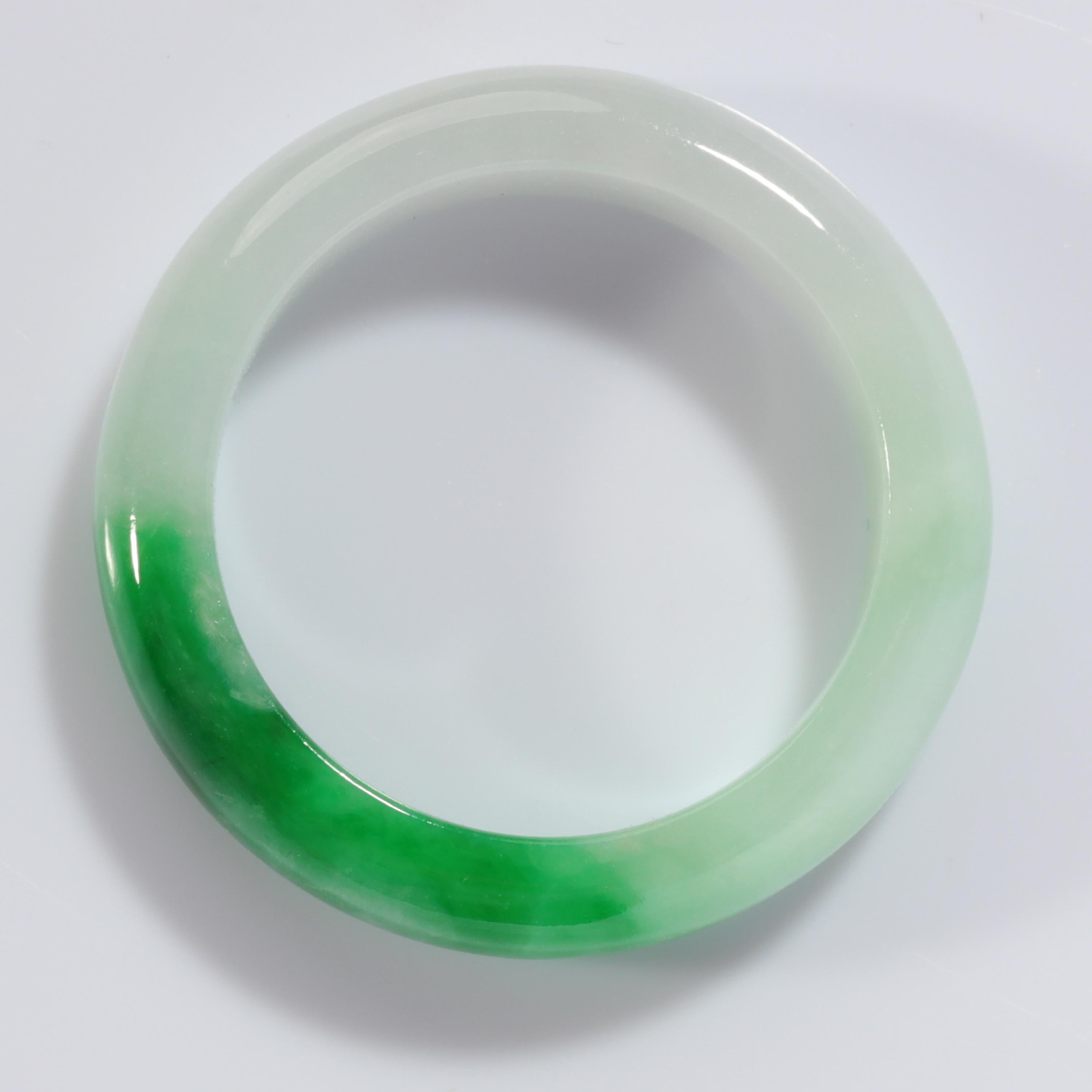 A pristine, never worn band of finely colored and translucent green makes for a most strikingly unique, beautiful, and durable wedding band. Or un-wedding band. Or stack ring. Or just the ring you buy yourself because you require a bump of