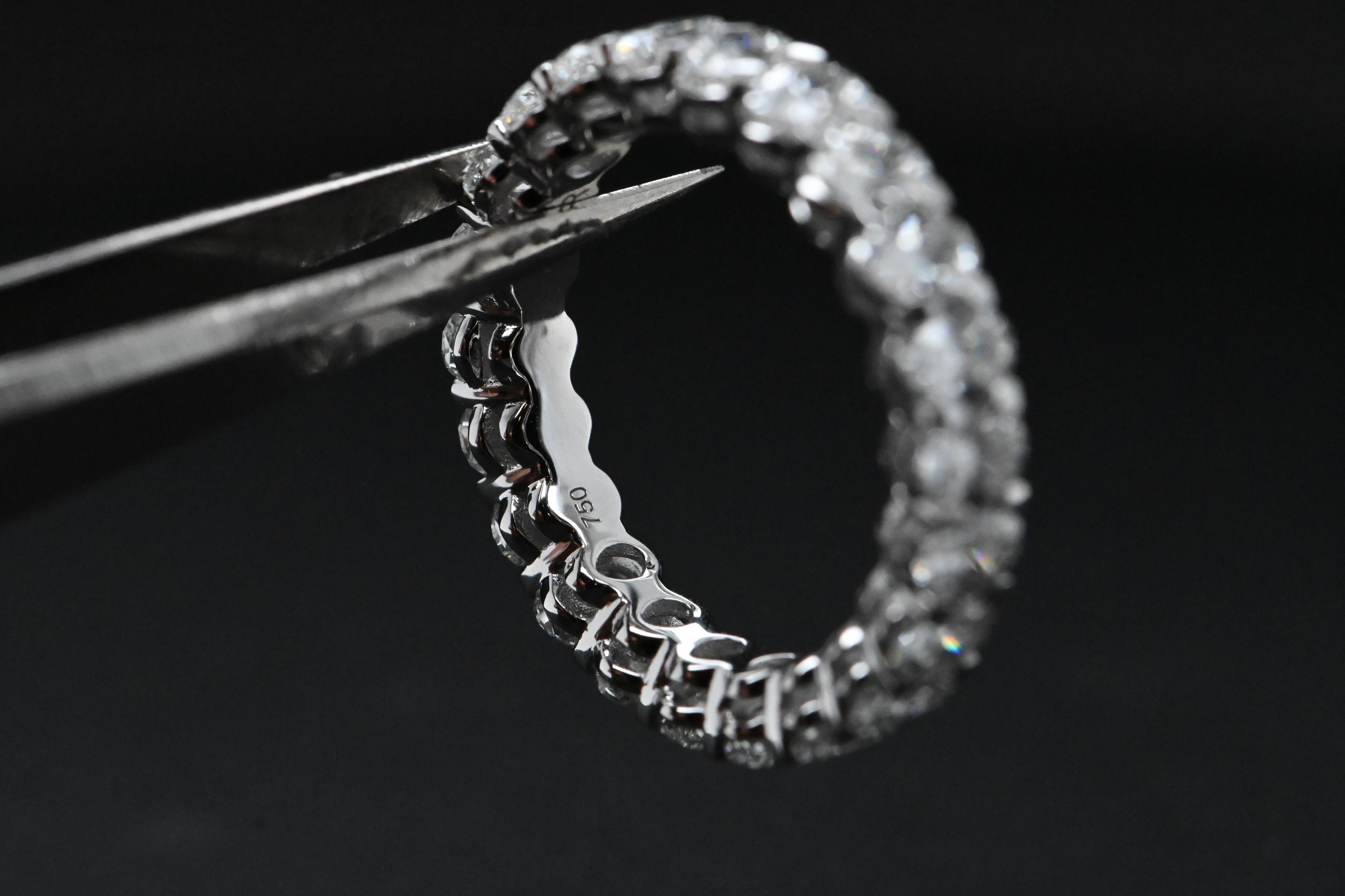 Oval Cut Wedding Band In 18-Carat White Gold Set With Diamonds Totaling 3.330-Carat For Sale