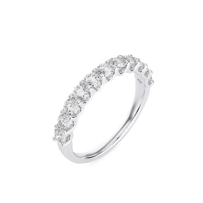 Diamond Total Carat Weight: This elegant 1981 Classic Collection wedding band ring features a total carat weight of 0.9 carats, showcasing 11 brilliant round diamonds that radiate exquisite sparkle and sophistication.

Gold Purity: Crafted with