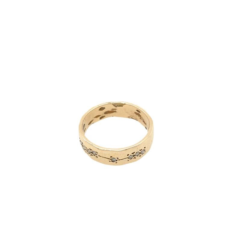 This stunning 9ct yellow gold ring is a perfect piece to have as an everyday wear, is very comfortable to wear. Set with 8 round diamonds, 0.08ct with hammered finish. It is the perfect choice for wedding ring.

Additional Information:
Total Diamond
