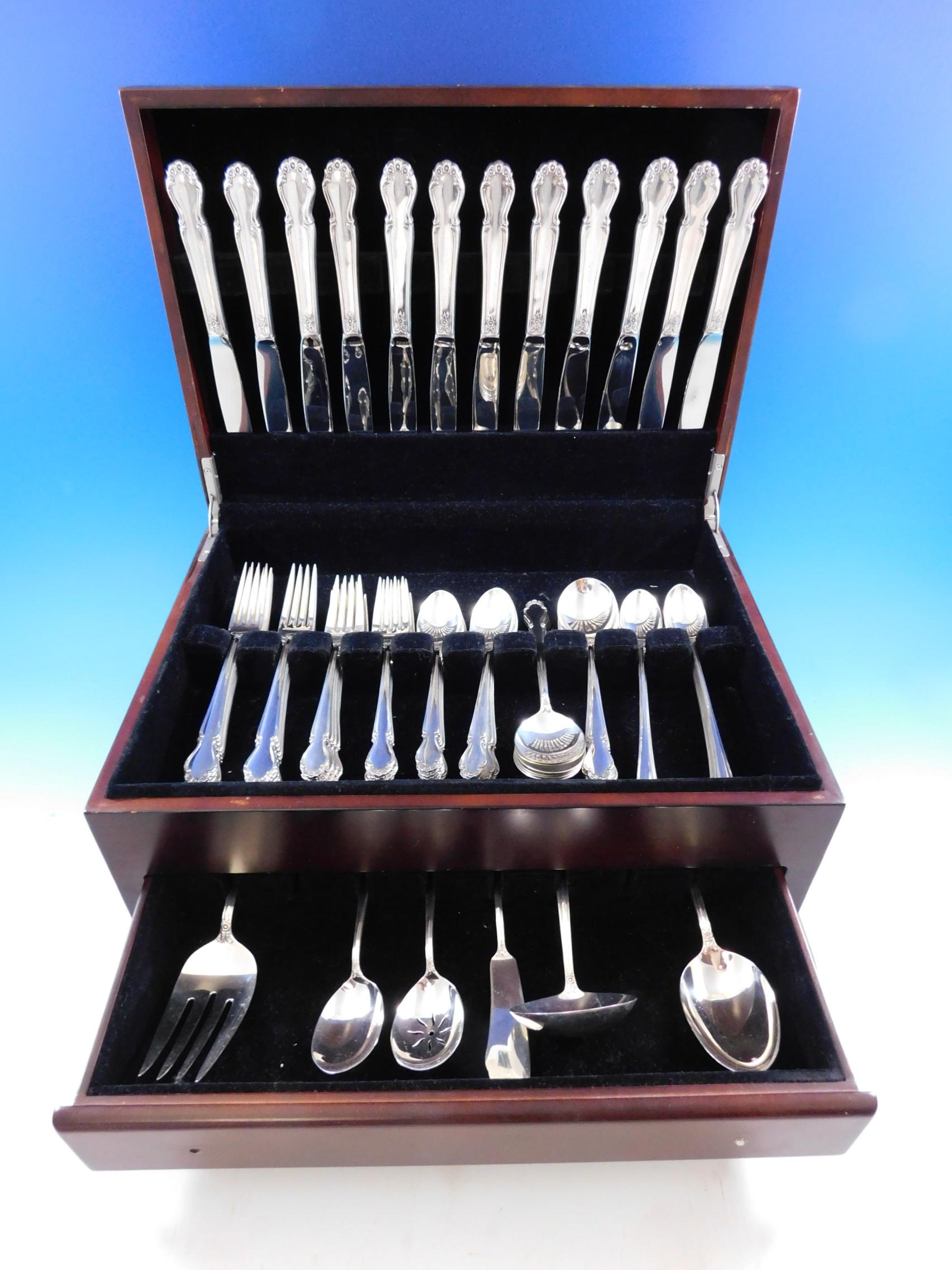 Wedding Bells by International sterling silver flatware set, 78 pieces. This set includes:

12 knives, 9