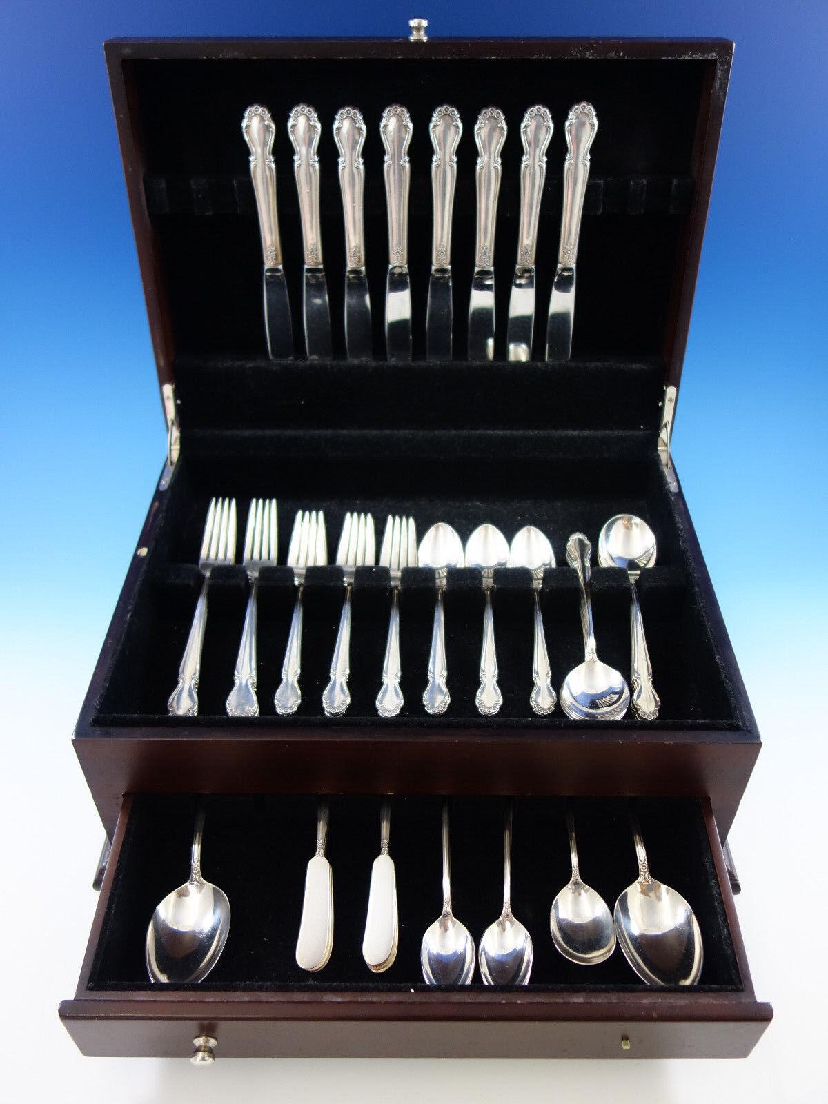 Hochzeitsglocken von International/Rogers Sterlingsilber-Besteck, 59 Teile. Dieses Set enthält:

8 Messer, 9