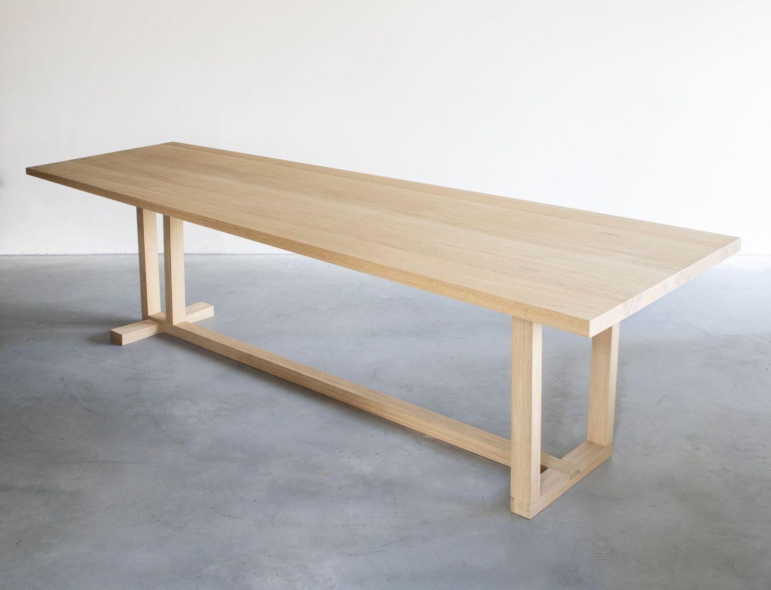 Wedge dining table by Van Rossum
Dimensions: D280 x W100 x H75 cm
Materials: Oak.

The wood is available in all standard Van Rossum colors, or in a matching finish to customer’s own sample. 

“I have tried to create something that is not
