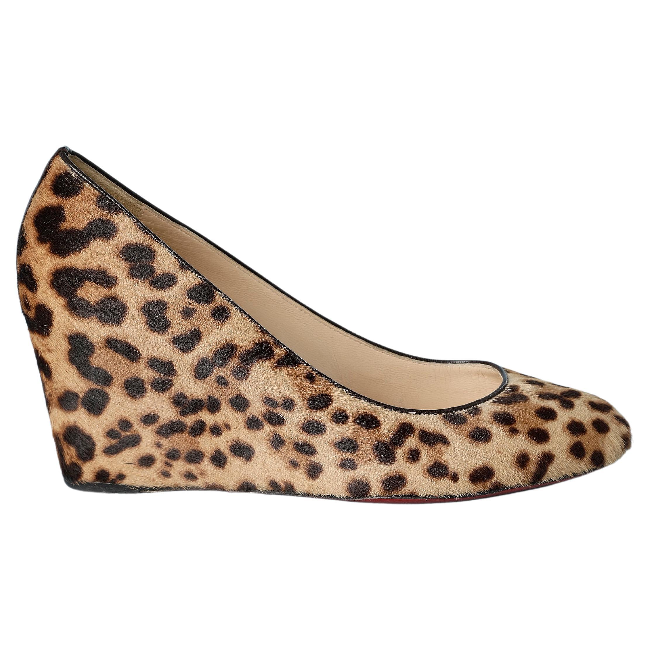 Wedge heel  pump made of goat fur with leopard print on Christian Louboutin  For Sale