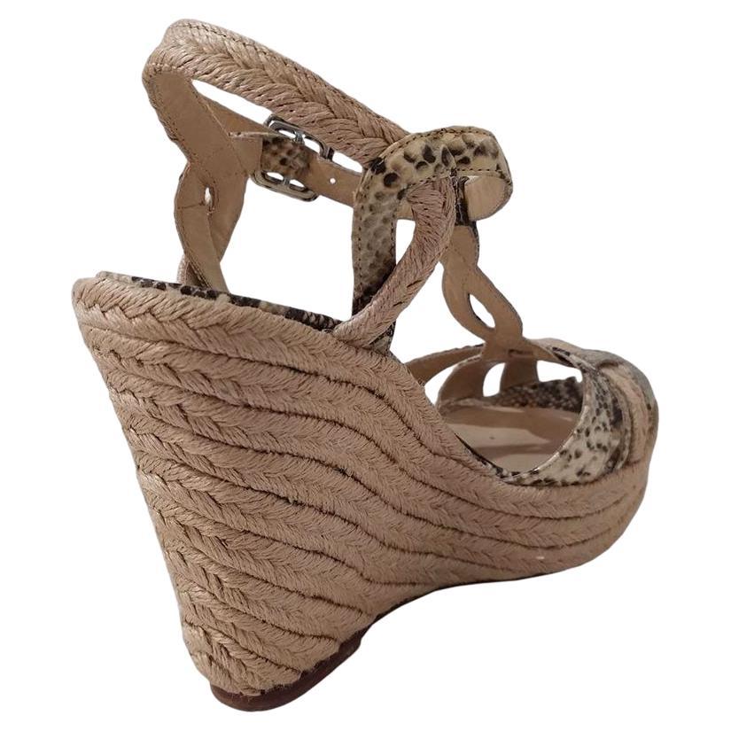 Python printed Rock color Heel height cm 12 (472 inches) Plateau height cm 3 (118 inches) Original price euro 264
