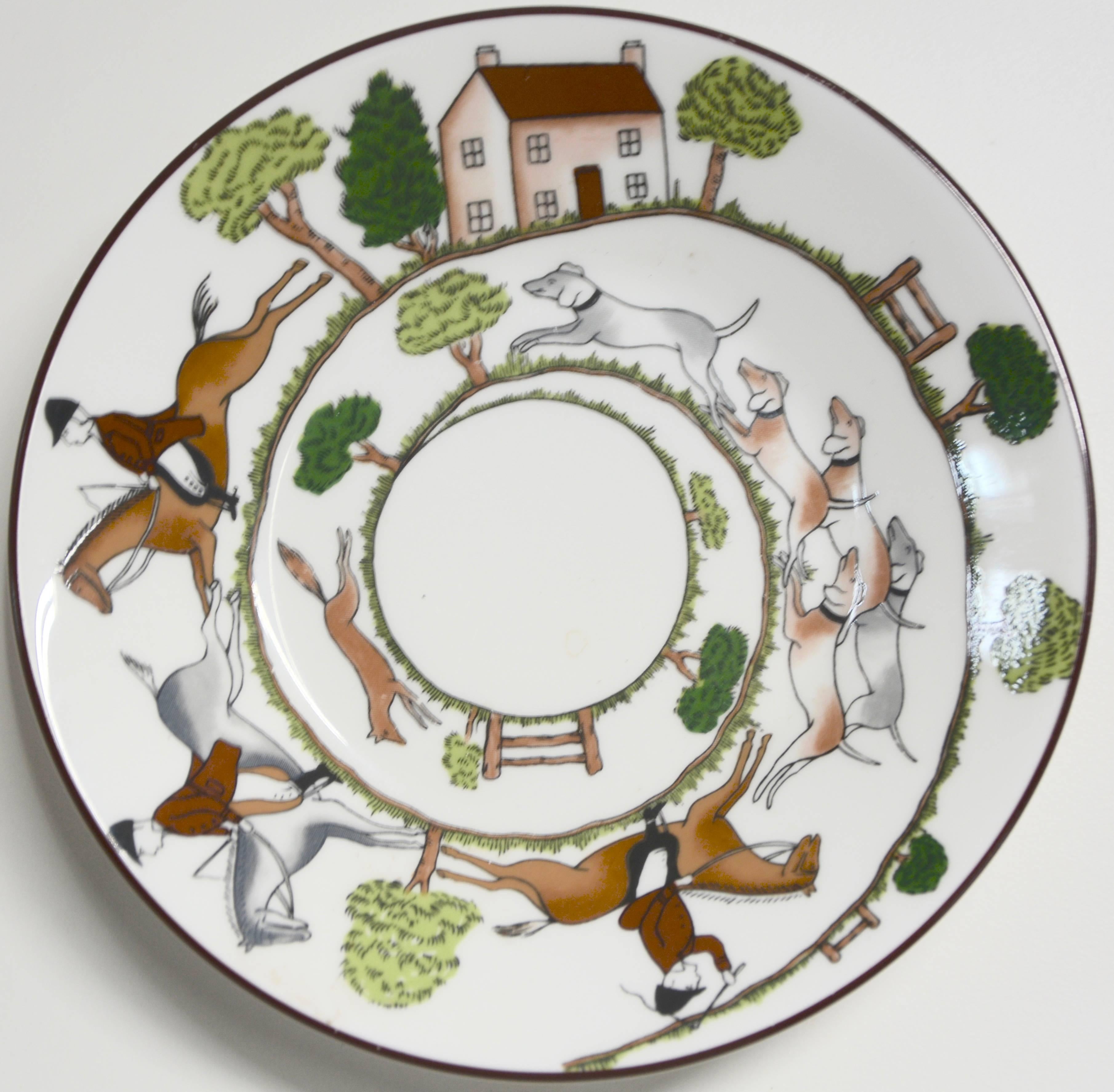 An equestrian scene decorates this set of three bread and butter bone china plates by Wedgewood of England. They are the Coalport series Hunting Scene. Each plate has horses and riders with their dogs and the hunting lodge along with some trees.