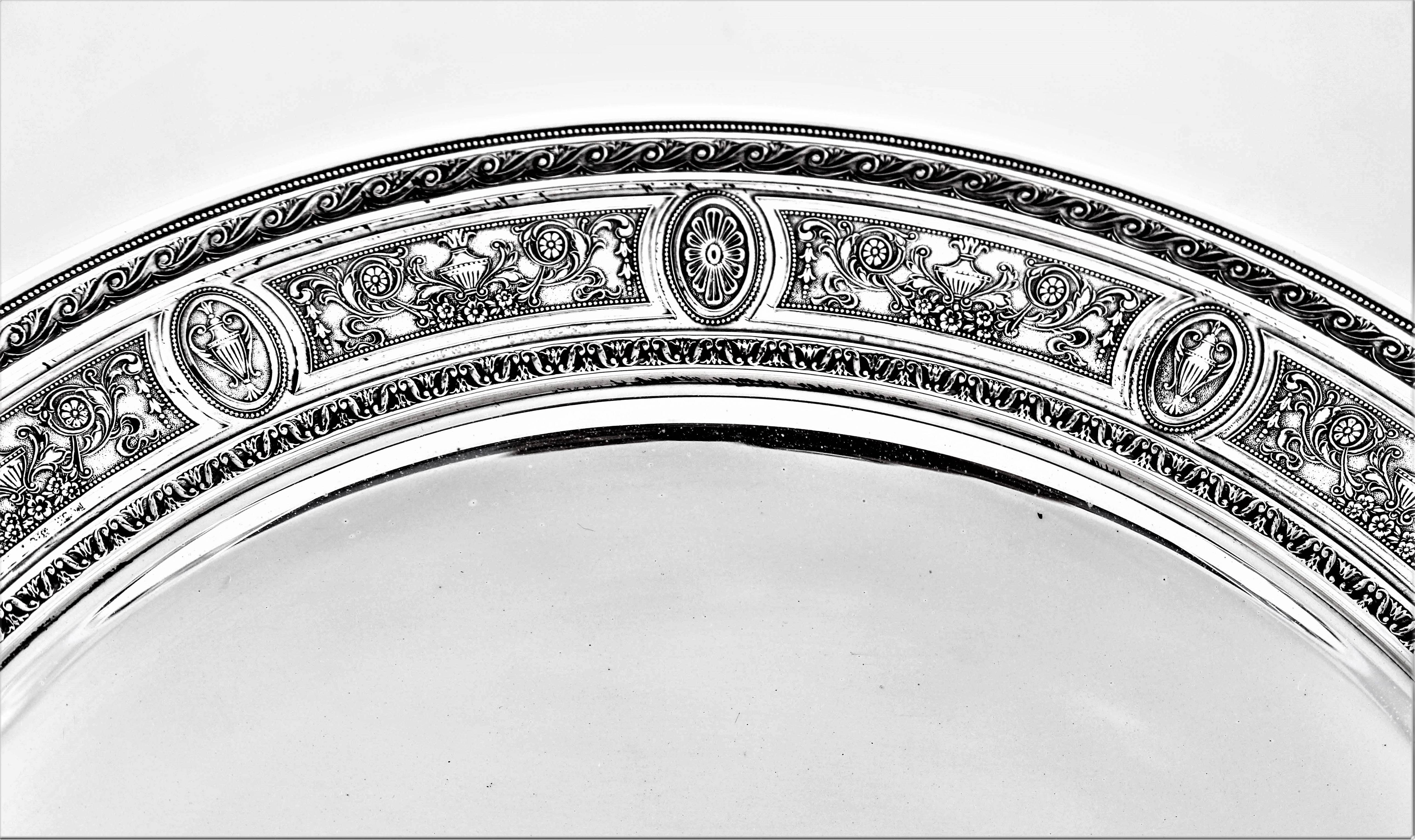 The Wedgewood pattern by International Silver is iconic. There are urns and medallions alternating throughout. Intermittently molding decor connects the two together. It was so popular as a flatware design that it was later made for hollowware. Tea