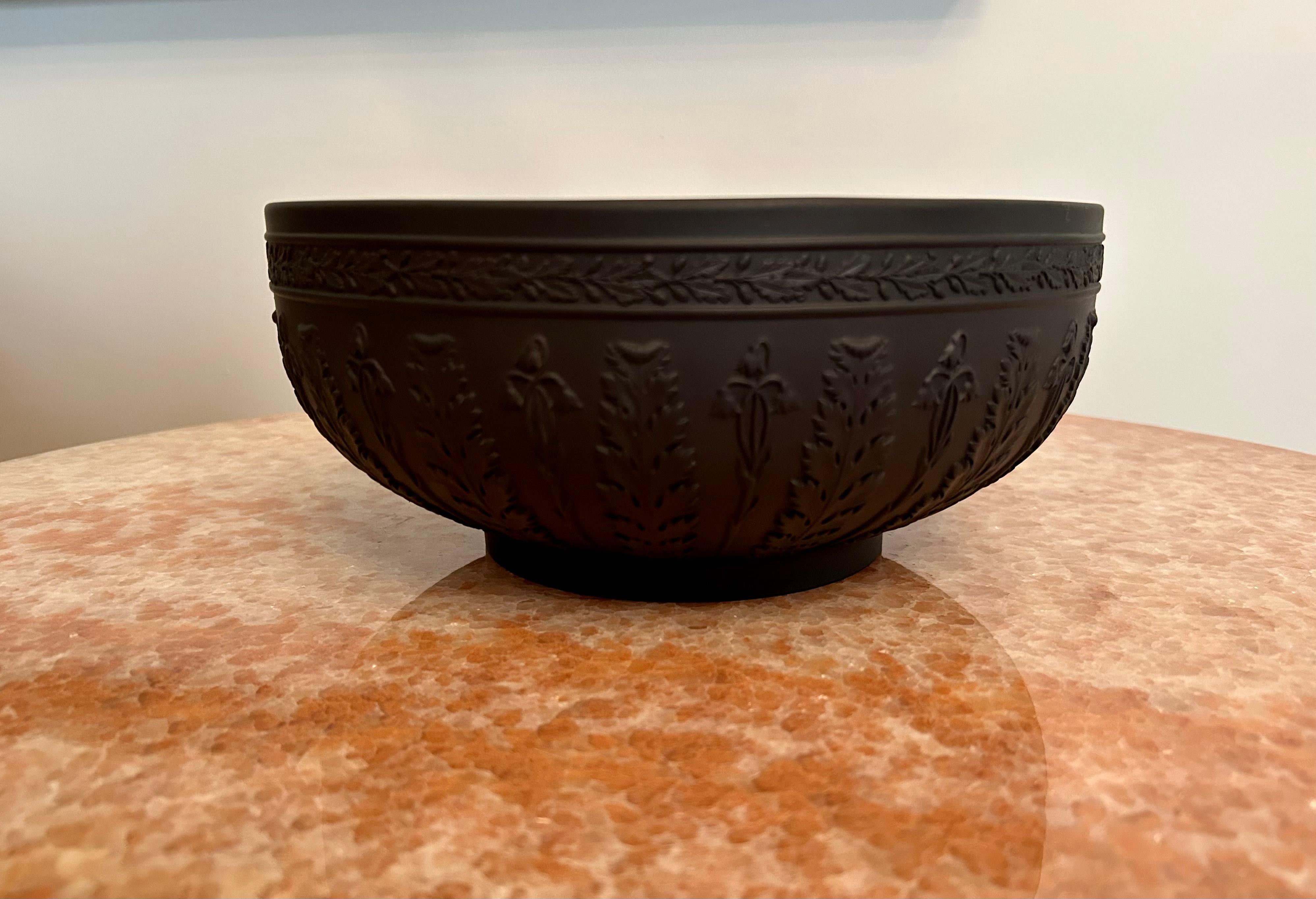 A beautiful Wedgwood basalt bowl in the acanthus pattern, dated 2012, in gold, on the base, and impressed WEDGWOOD MADE IN ENGLAND.
This bowl was made to commemorate the 250th Anniversary of Wedgwood. It comes in an original gift box which also