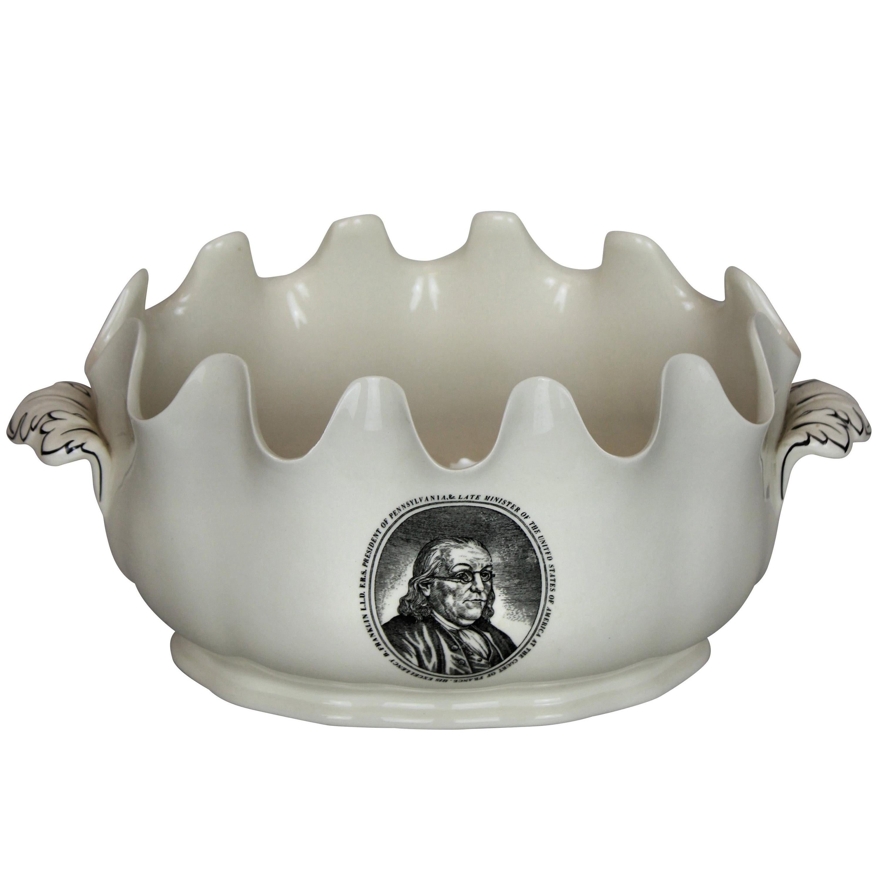A Wedgwood cream ware cachepot with attractive scalloped edge depicting Benjamin Franklin.

