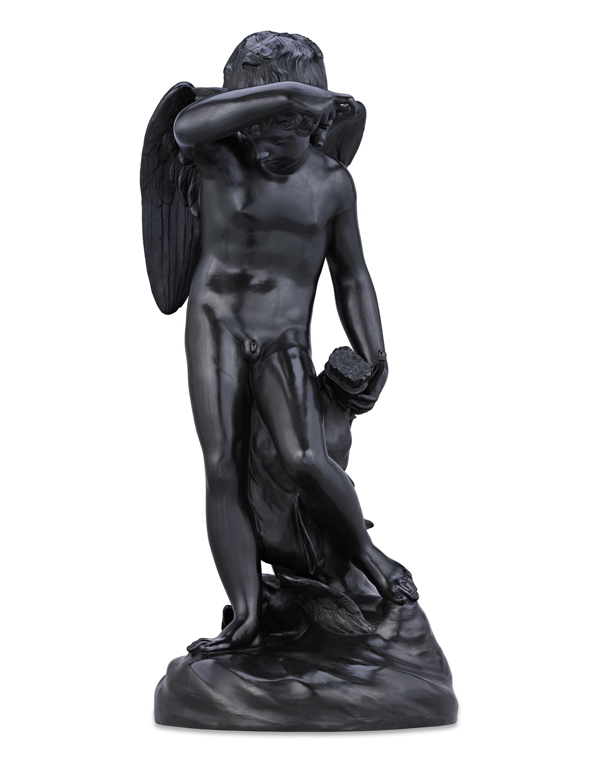 An important homage to love, this large black basalt figure is an impressive example of Wedgwood's artistry and imagination. Cupid, the ancient Roman god of love, is standing amongst billowing clouds with a pair of doves at his feet. Gazing towards