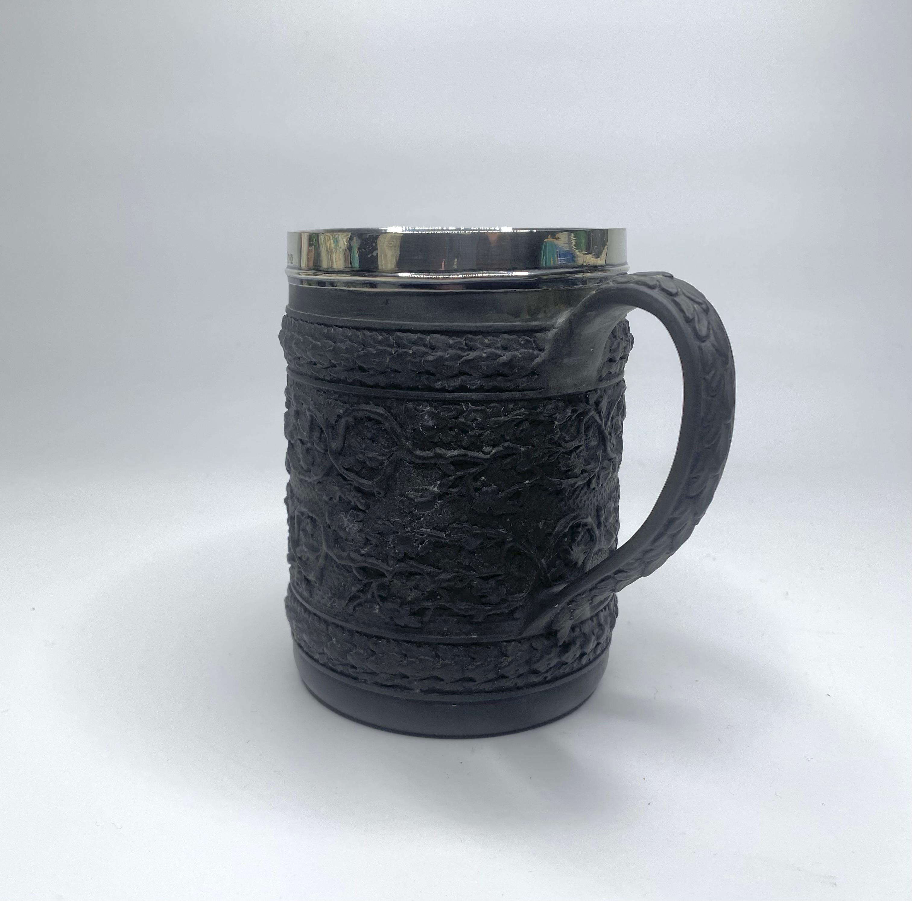 English Wedgwood black basalt mug, silver mounted, 1808.