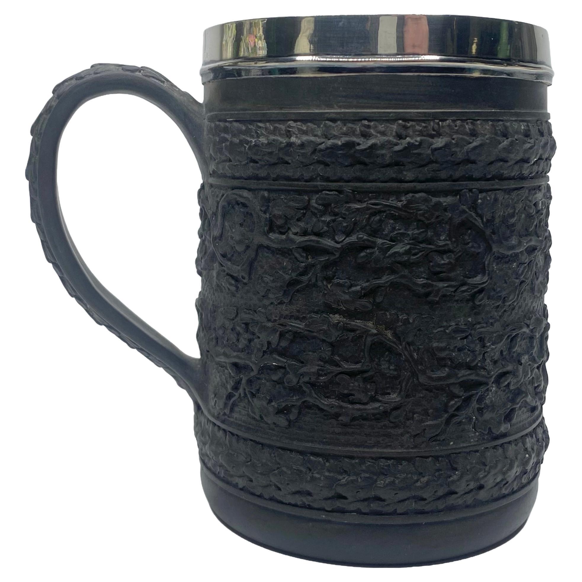Wedgwood black basalt mug, silver mounted, 1808.