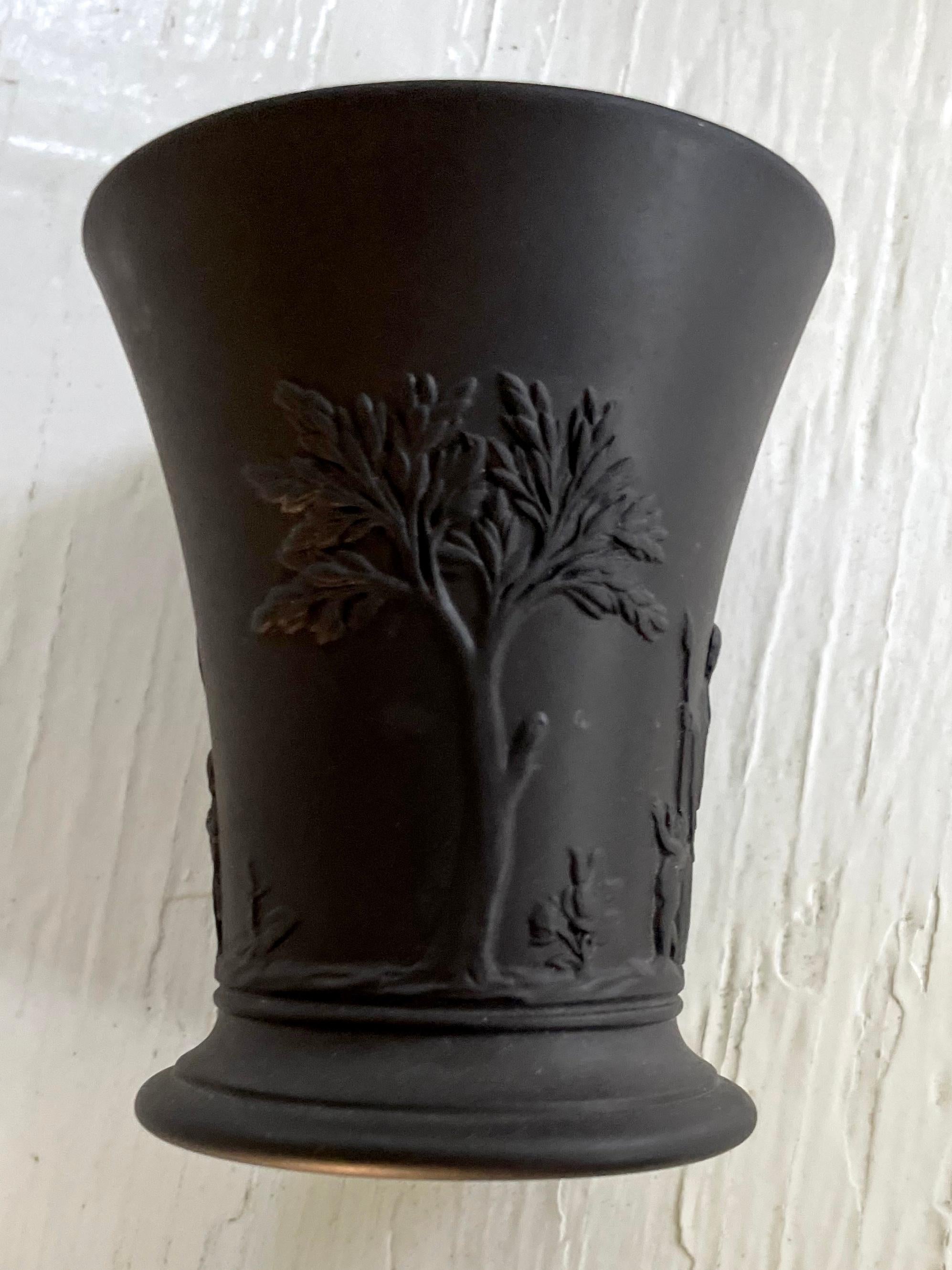 Basalt neoclassical shape budvase/beaker with figures and trees
Dimensions: 3.25