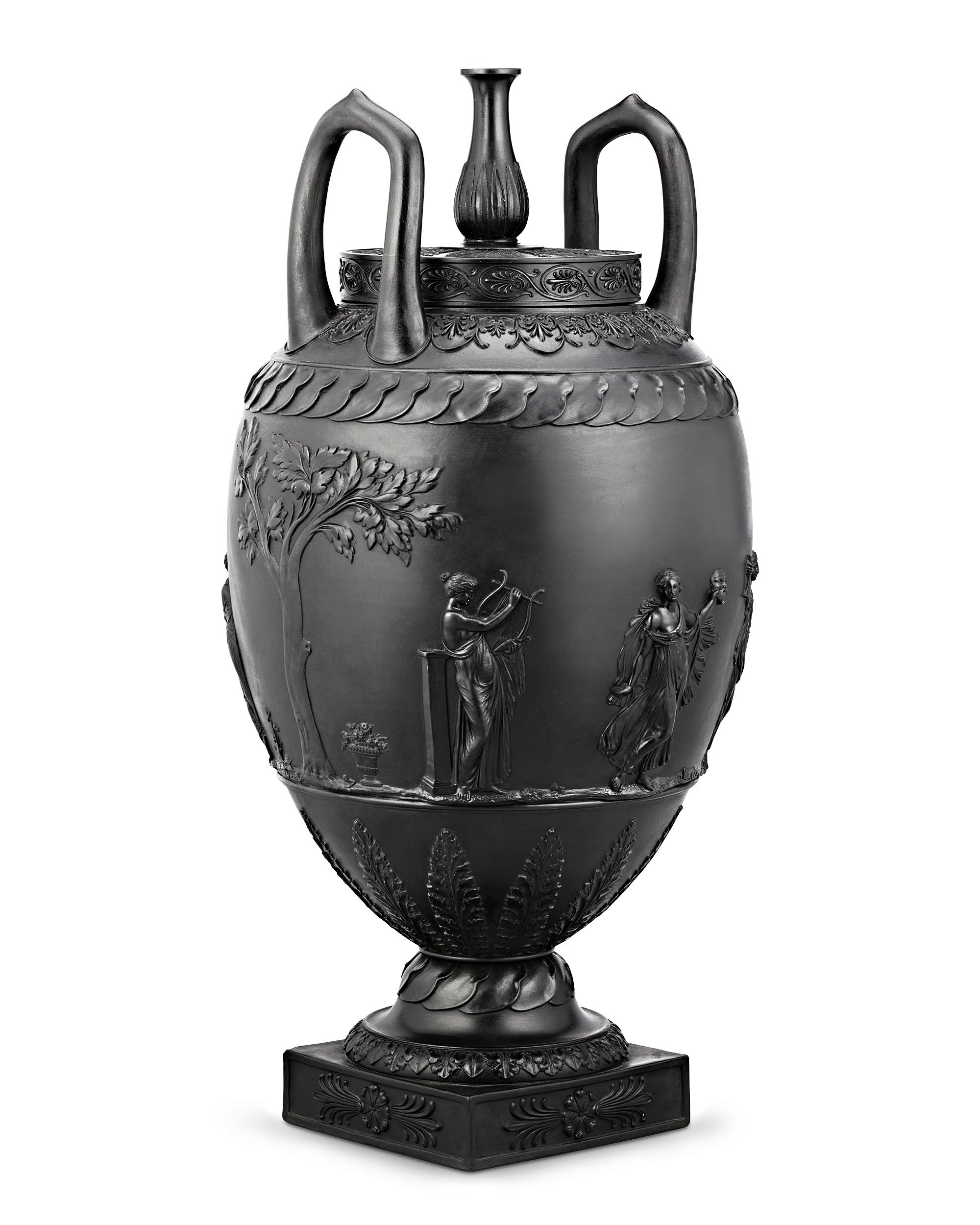 A remarkable example of Josiah Wedgwood's legendary ceramic art, the importance and rarity of this urn vase simply cannot be overstated. Black basalt refers to the fine-grained stoneware developed by Josiah Wedgwood in the 1760s that was inspired by