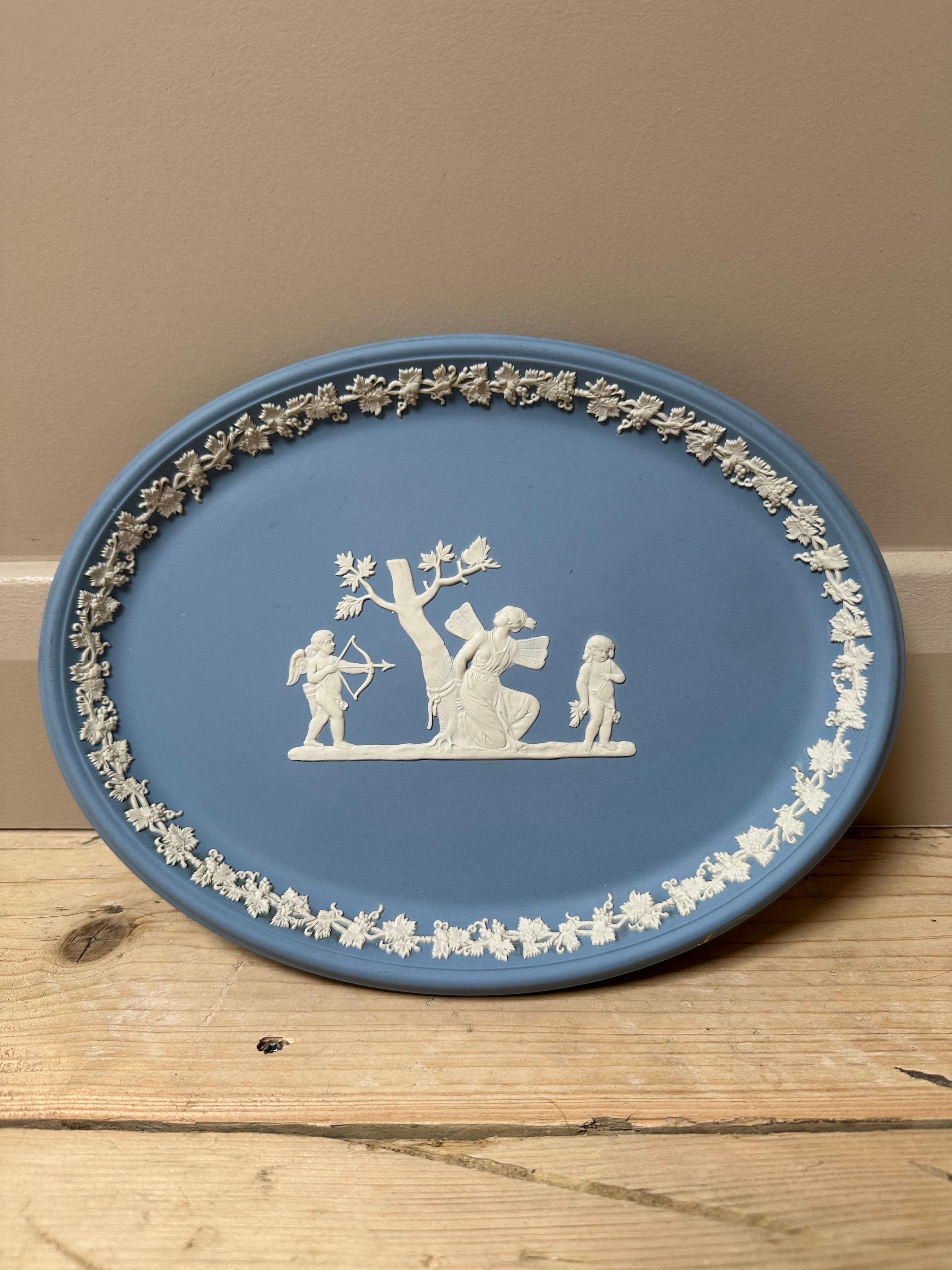 Elevate your collection with this exquisite vintage Wedgwood Jasperware oval plate, a timeless piece that embodies the artistry and craftsmanship of one of Britain’s most celebrated potteries.

Crafted from classic pale blue Jasperware, this elegant