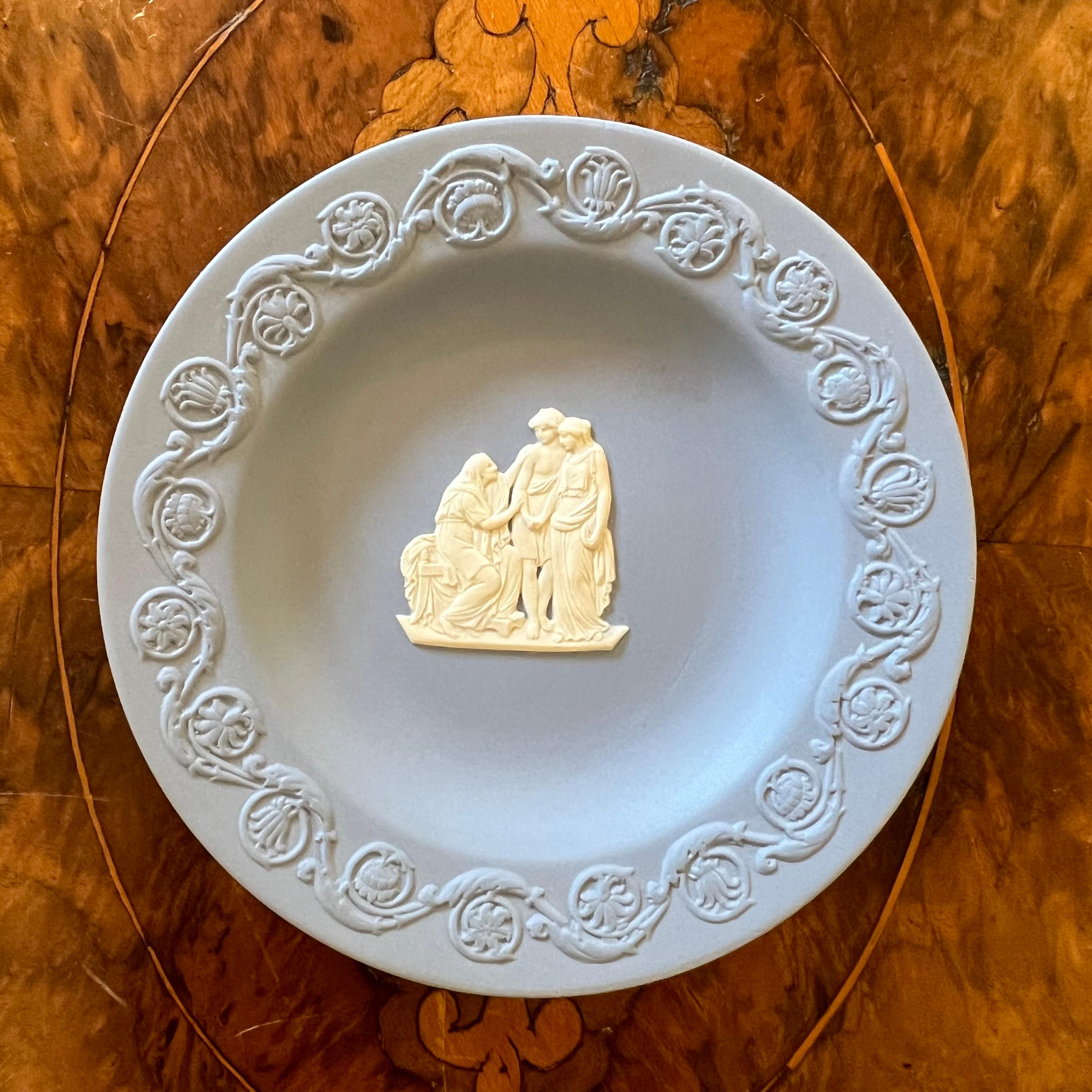 Description: Blue background with embossed white detail, stamped Wedwood 

Material: Ceramic

Measurements: 11cm diameter 

Country Of Origin: England 

Postage via Australia Post with tracking available