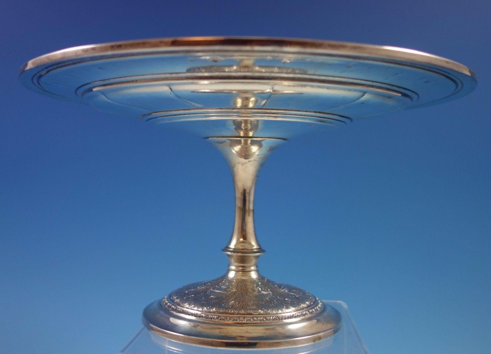 Wedgwood by International sterling silver large fluted compote with fancy design on the base. The piece is marked with #T41-1, it measures 5 3/8