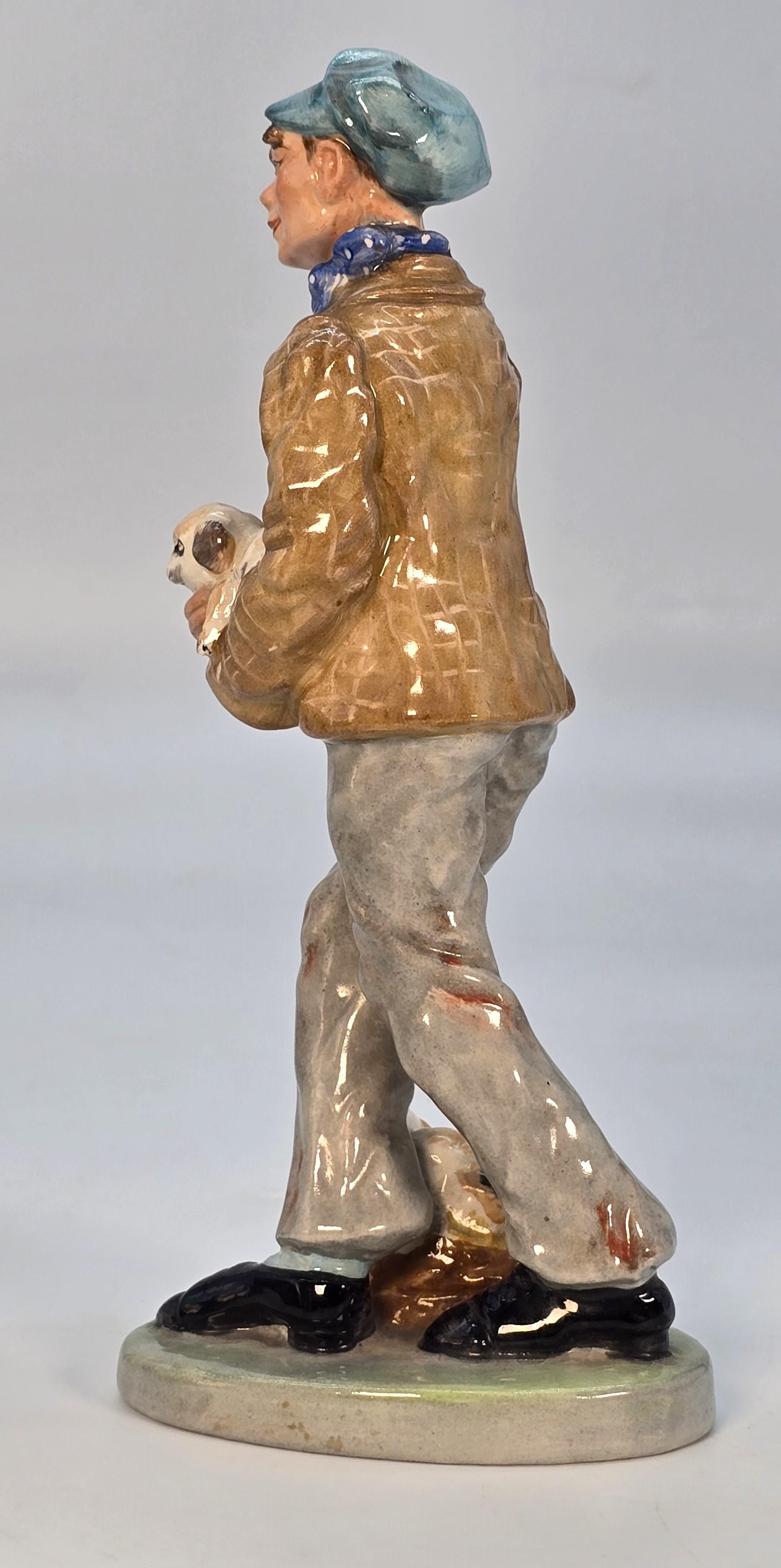 Dipinto a mano Wedgwood & Co. Ltd China figura del venditore di cuccioli, inglese, circa 1910 in vendita