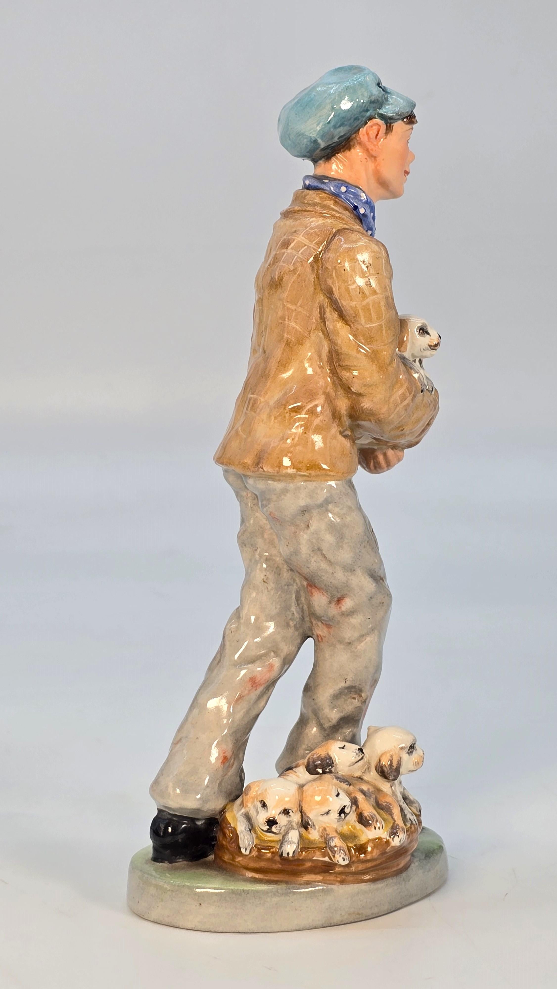Porcellana Wedgwood & Co. Ltd China figura del venditore di cuccioli, inglese, circa 1910 in vendita