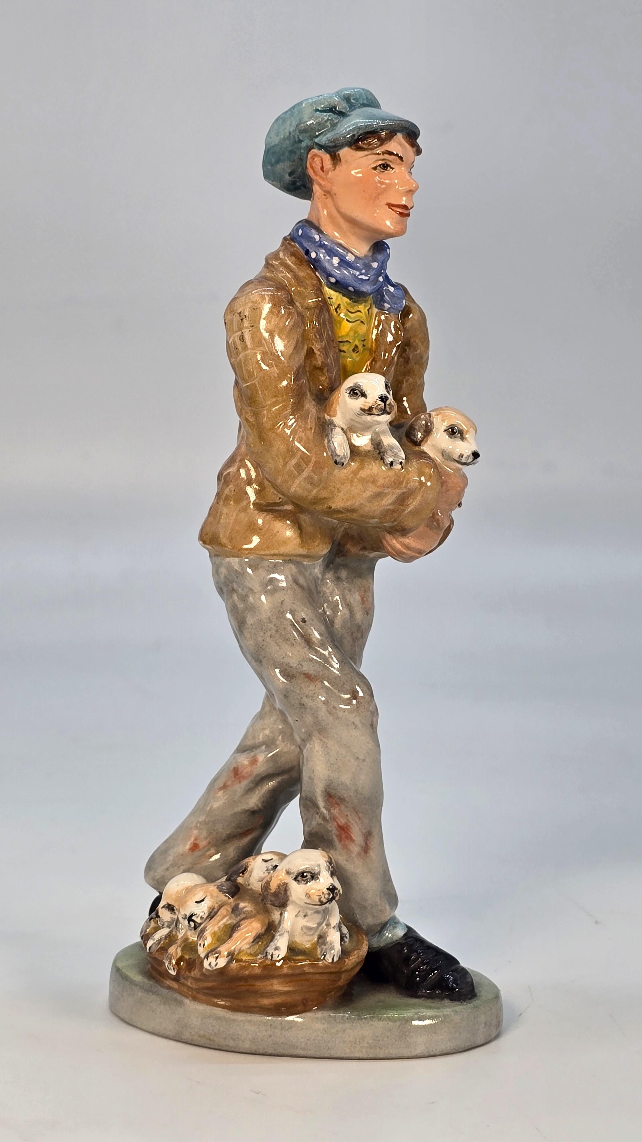Wedgwood & Co. Ltd China figura del venditore di cuccioli, inglese, circa 1910 in vendita 1