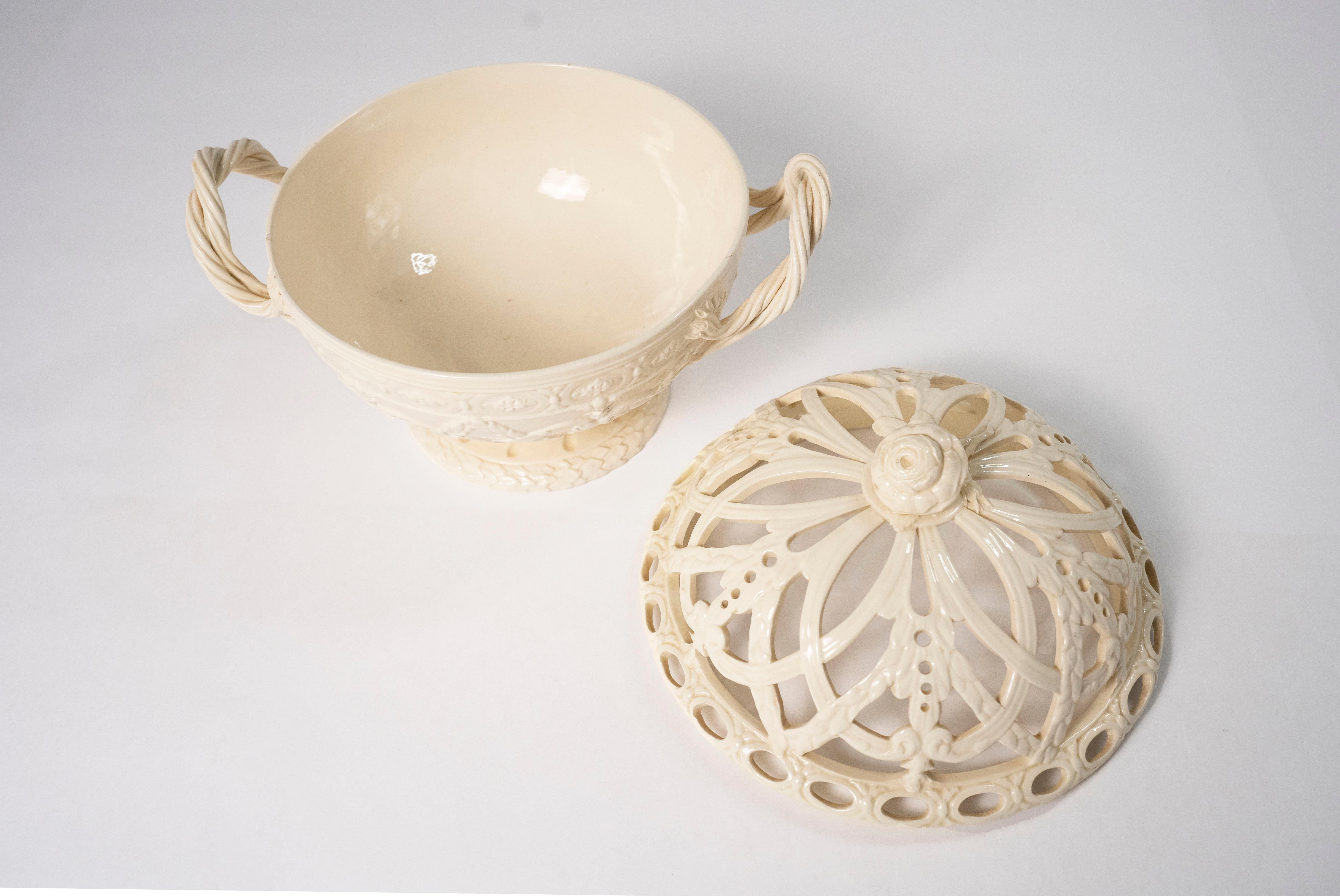 A beautiful Wedgwood fruit bowl with cover, 18th century.  The design for both the cover and the basket are illustrated in 
