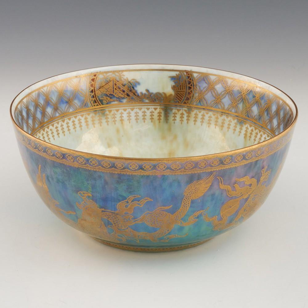 Heading :  Wedgwood Celestial Dragon lustre bowl
Date : c1925
Period : George V
Marks : Gilt Wedgood * England below the Portland Vase along with the pattern number Z4831 ( Celestial Dragon) in puce
Origin : Staffordshire, England
Colour :