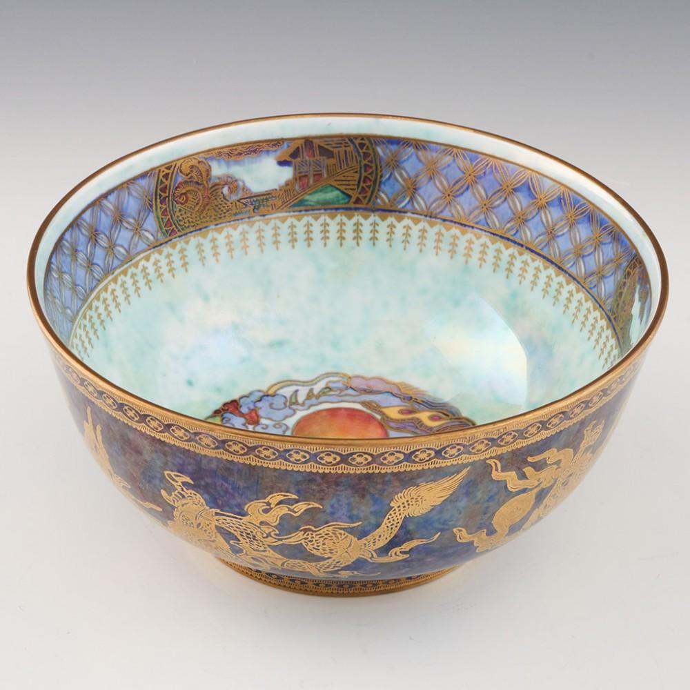 Wedgwood Dragon Lustre Bowl, circa 1925

Additional Information:
Date: circa 1925
Period: George V
Marks: Portland Vase along with WEDGWOOD MADE IN ENGLAND and the pattern number 24801
Origin: Etruria, Staffordshire
Colour: