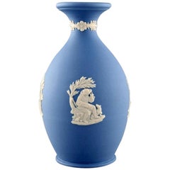 Wedgwood, England, Small Vase in Light Blue Stoneware with Classicist Scenes,