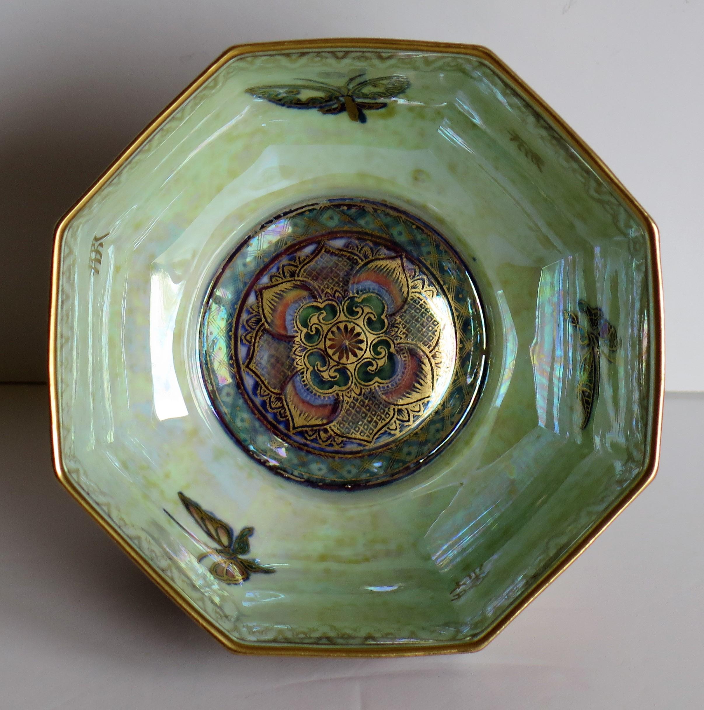This is a high quality Art Deco period, porcelain octagonal Bowl from the Fairyland Lustre range, pattern Z4827, designed by Daisy Makeig-Jones and made by the Wedgwood factory, England, circa 1925.

This beautiful bowl has a mottled opalescent