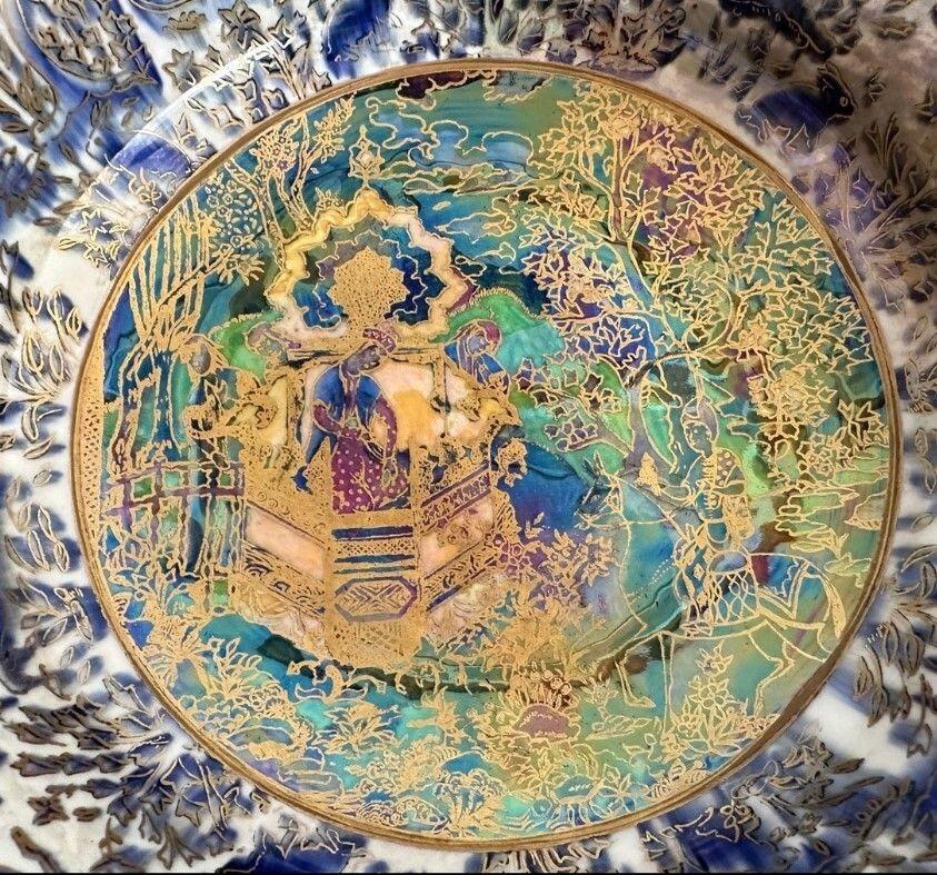 5438
Daisy Makeig Jones for Wedgwood. A Large Daventry Bowl decorated with the Nizami Design featuring a menagerie of animals and birds including Cats, Rabbits and Ferocious Beasts with an exterior of an Art Deco style floral design
33cm wide, 13cm