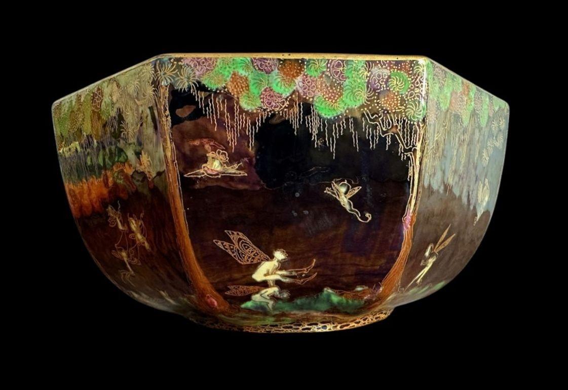 5511
Wedgwood Fairyland Lustre Octagonal Bowl decorated with “Fairy in a Cage” and “Leapfrogging Elves” designs by Daisy Makeig Jones
24cm x 11cm
Circa 1920