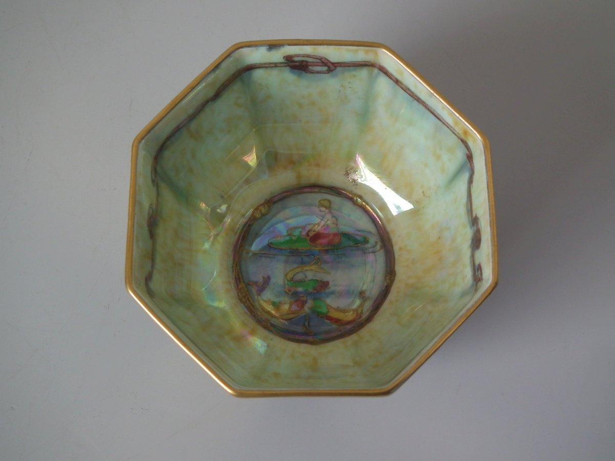 Wedgwood Fairyland Lustre octagonal bowl decorated with 'Firbolgs' design on ruby lustre to exterior, 'Thumbelina' design to the interior. 'Roseberry Bead' border to the foot rim. 'Portland Vase' backstamp and pattern number Z5200 to the underside.