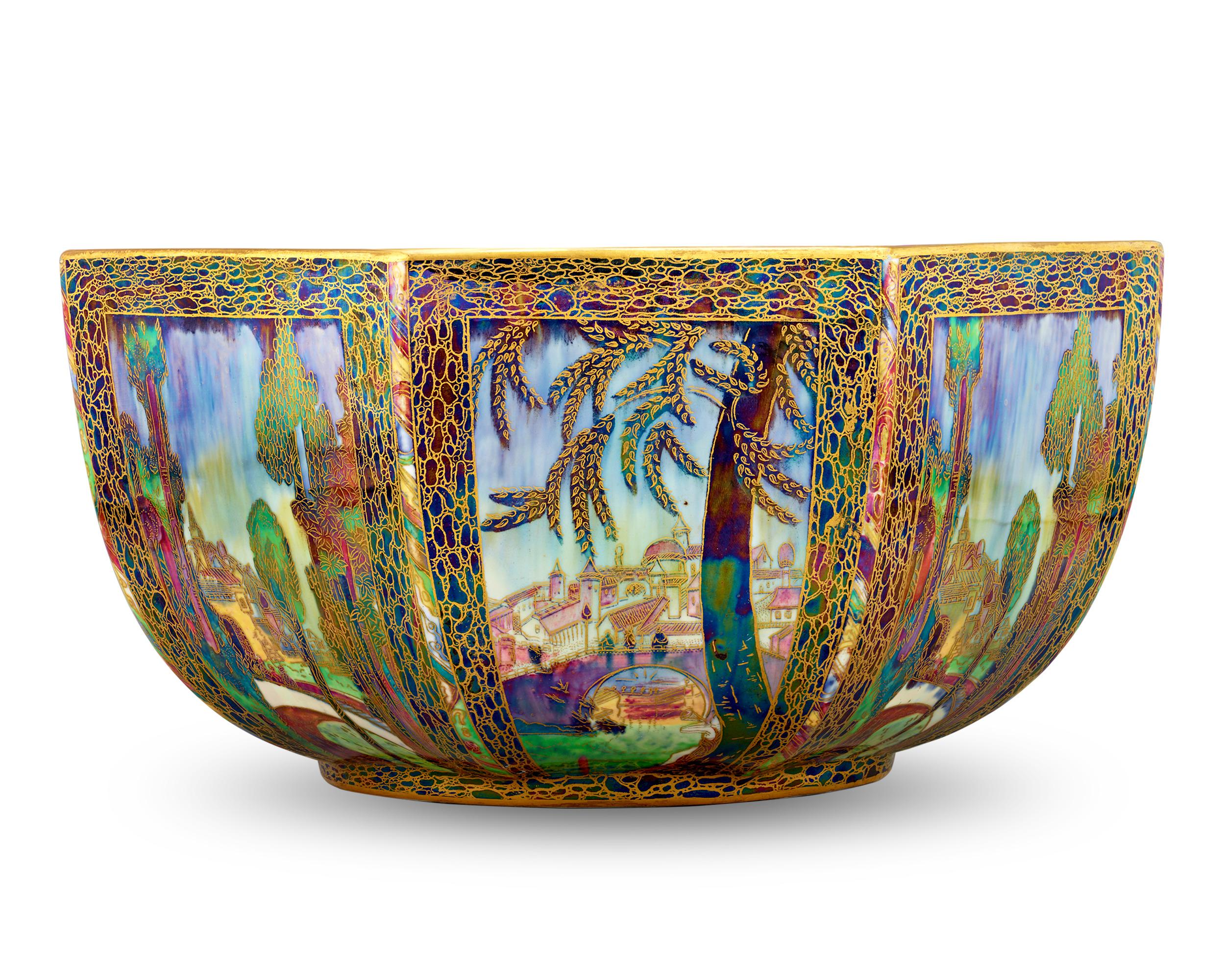 This rare Wedgwood Fairyland Lustre octagon bowl designed by Daisy Makeig-Jones exudes the timeless whimsy of the Fairyland line. Exhibiting fiery colors and scenes from a fantastical world, the octagonal design features a beautiful combination of