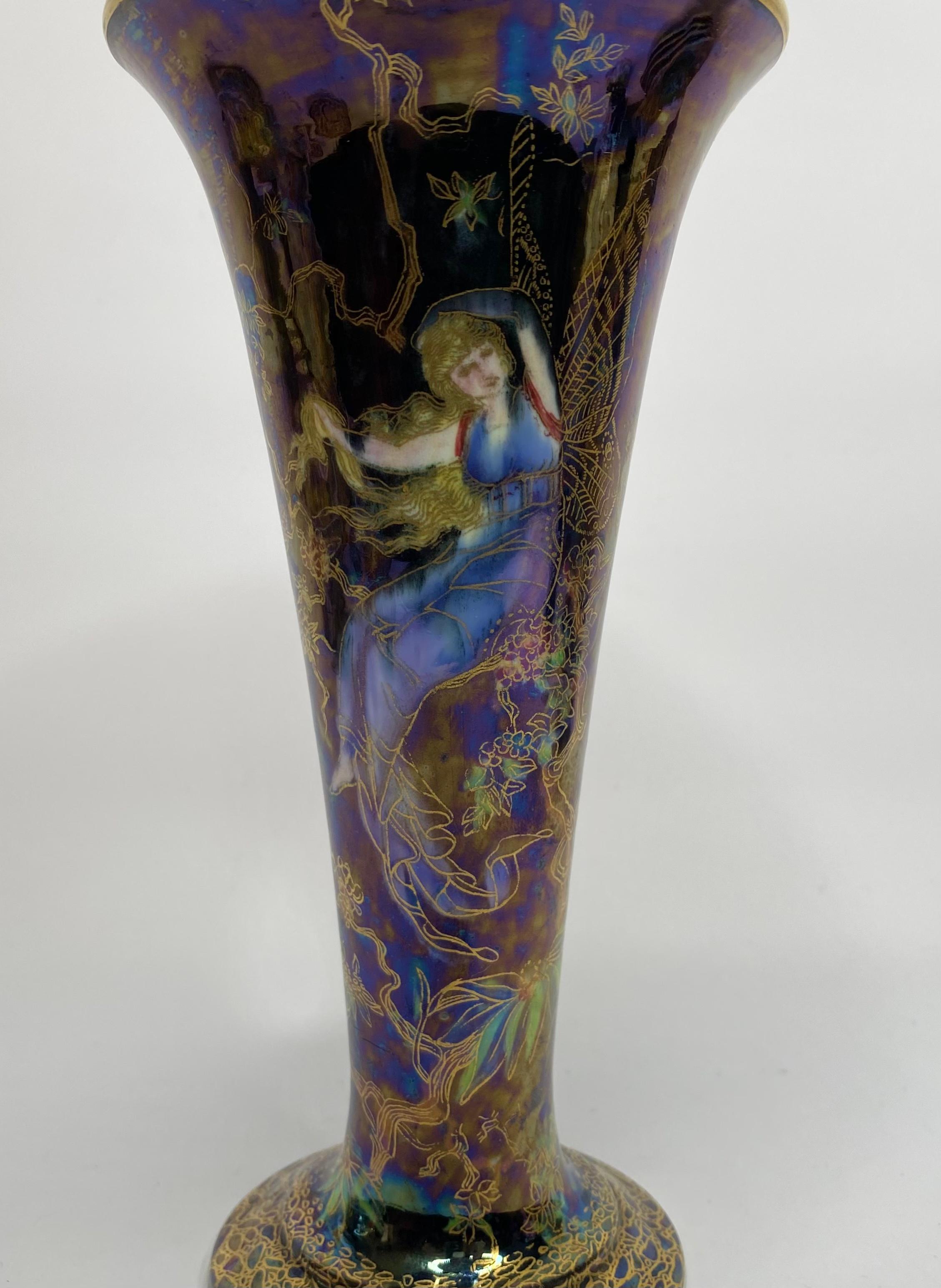 Wedgwood Fairyland lustre vase ‘Butterfly Women’, circa 1925.

£1,950.00
Wedgwood Fairyland Lustre vase, circa 1925. The Daisy Makeig-Jones designed conical shaped vase, decorated with the ‘Butterfly Women’ pattern, of fairies sat amongst