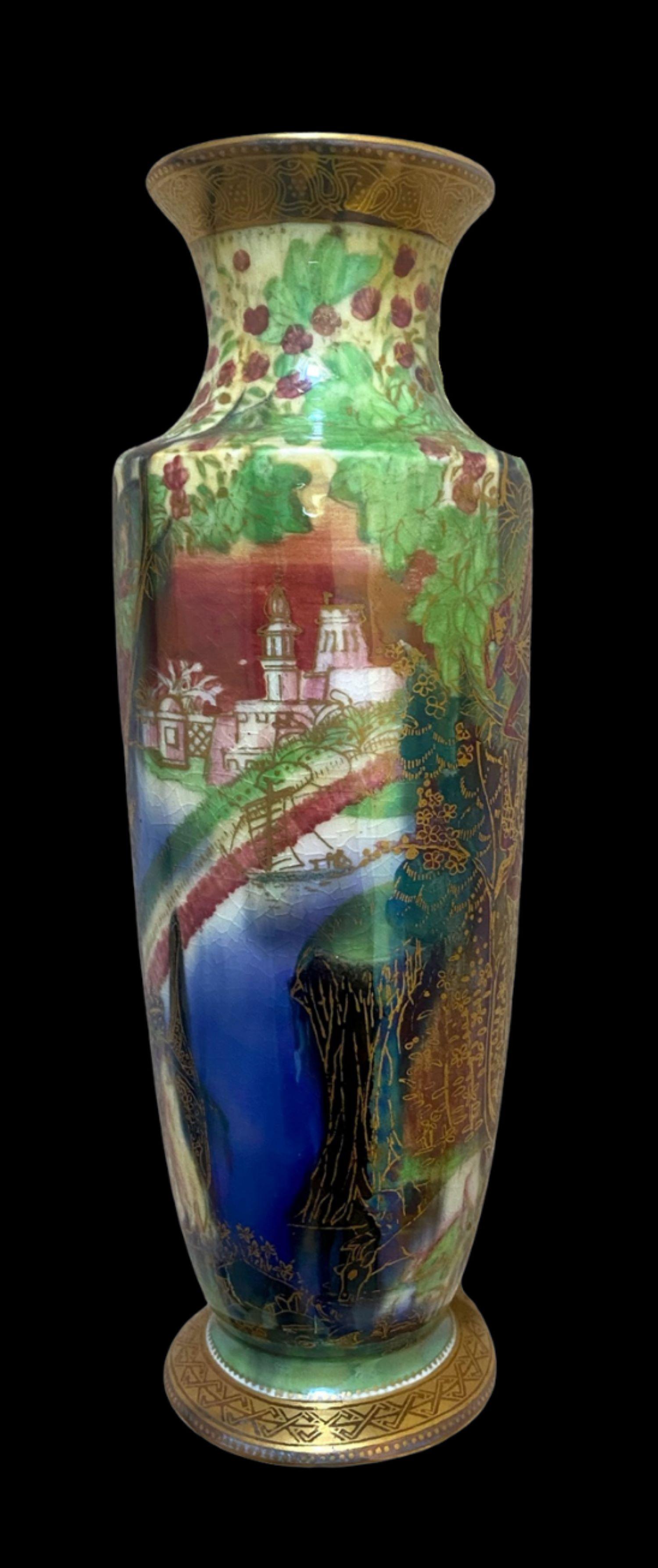 5146

Wedgwood Fairyland Lustre Vase decorated in the scarce Bifrost design by Daisy Makeig Jones

21.5cm high

Circa 1920