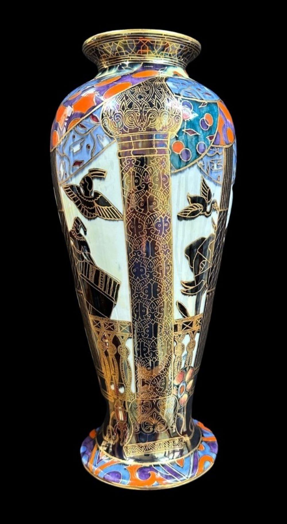 5437
Daisy Makeig Jones for Wedgwood. A Baluster Vase decorated with the “Lahore” design featuring Elephants and Birds within an Art Deco Border
26.5cm high, 11cm wide
Circa 1920