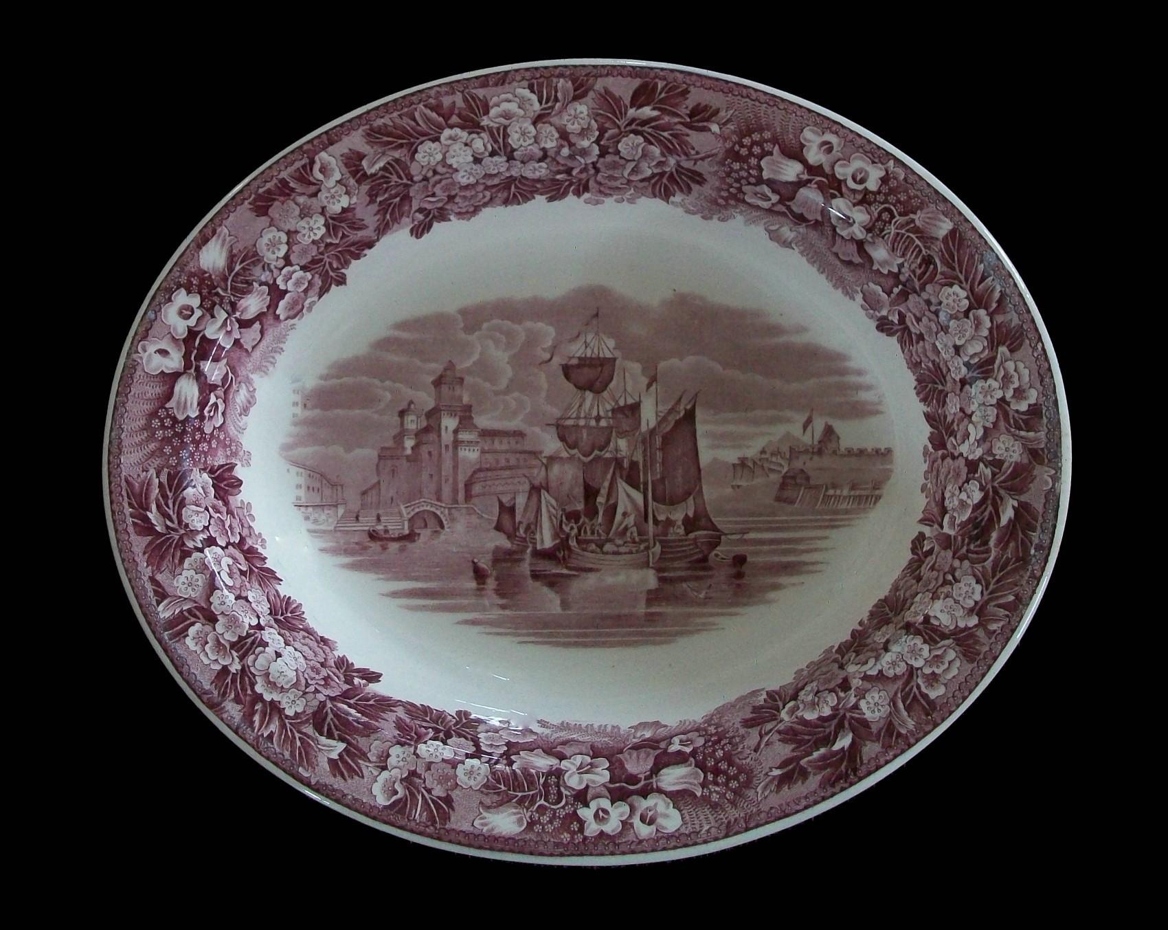 WEDGWOOD - 'Ferrara' - Antique ceramic serving bowl - transfer decorated in red (Mulberry) on a cream ground - elaborate decoration featuring a central panel with a ship and castle within a landscape - floral border - floral band to the outside wall