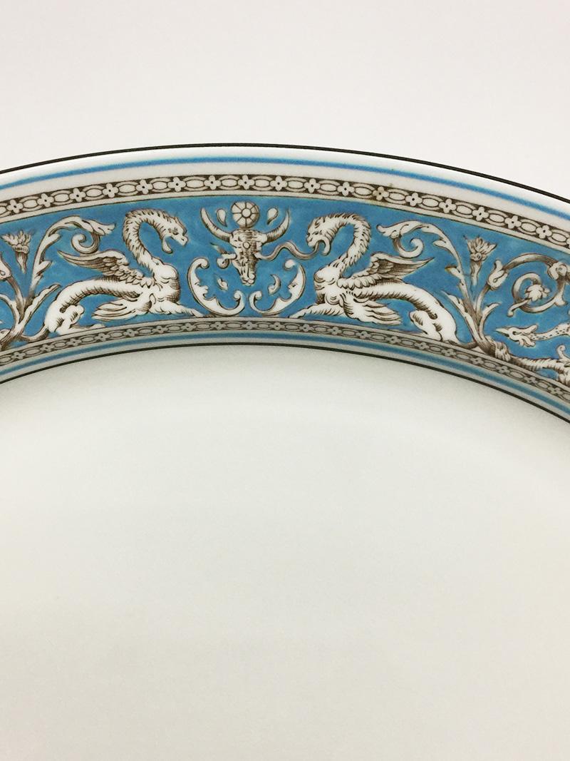 Porcelain plates by Wedgwood with Florentine Turquoise Rim, 1960s

Porcelain plates set by Wedgwood  with the pattern Florentine Turquoise colored rim, Prestige collection
Circa 1967.  The porcelain is Bone china and made in England

1 meat dish