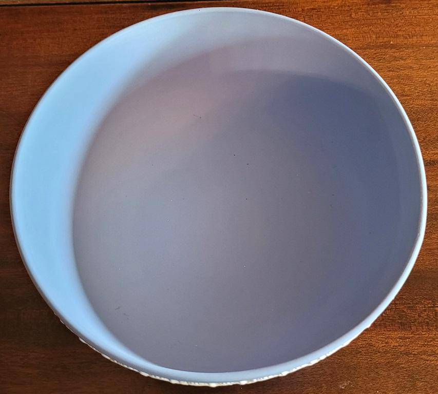 PRESENTING A LOVELY Wedgwood Jasperware Pale Blue Centerpiece Bowl.

Made by Wedgwood in England in 1957 and fully and properly marked/stamped on base.

Marked: “Wedgwood, Made in England …. “g” … “6” ….. “57”.

7.75 inch diameter bowl or