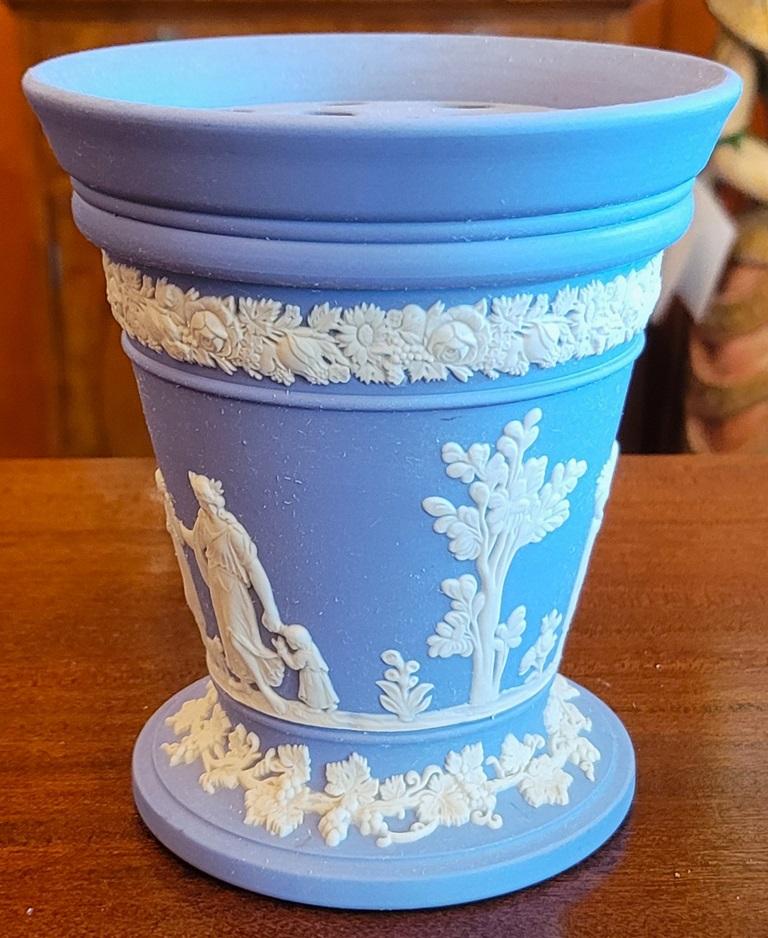 PRESENTING A LOVELY Wedgwood Jasperware Pale Blue Vase with Frog Insert.

Made by Wedgwood in England in 1971 and fully and properly marked/stamped on base.

Marked: “Wedgwood, Made in England …. “C” … “RP” ….. “71”.

5 inch tall Vase with