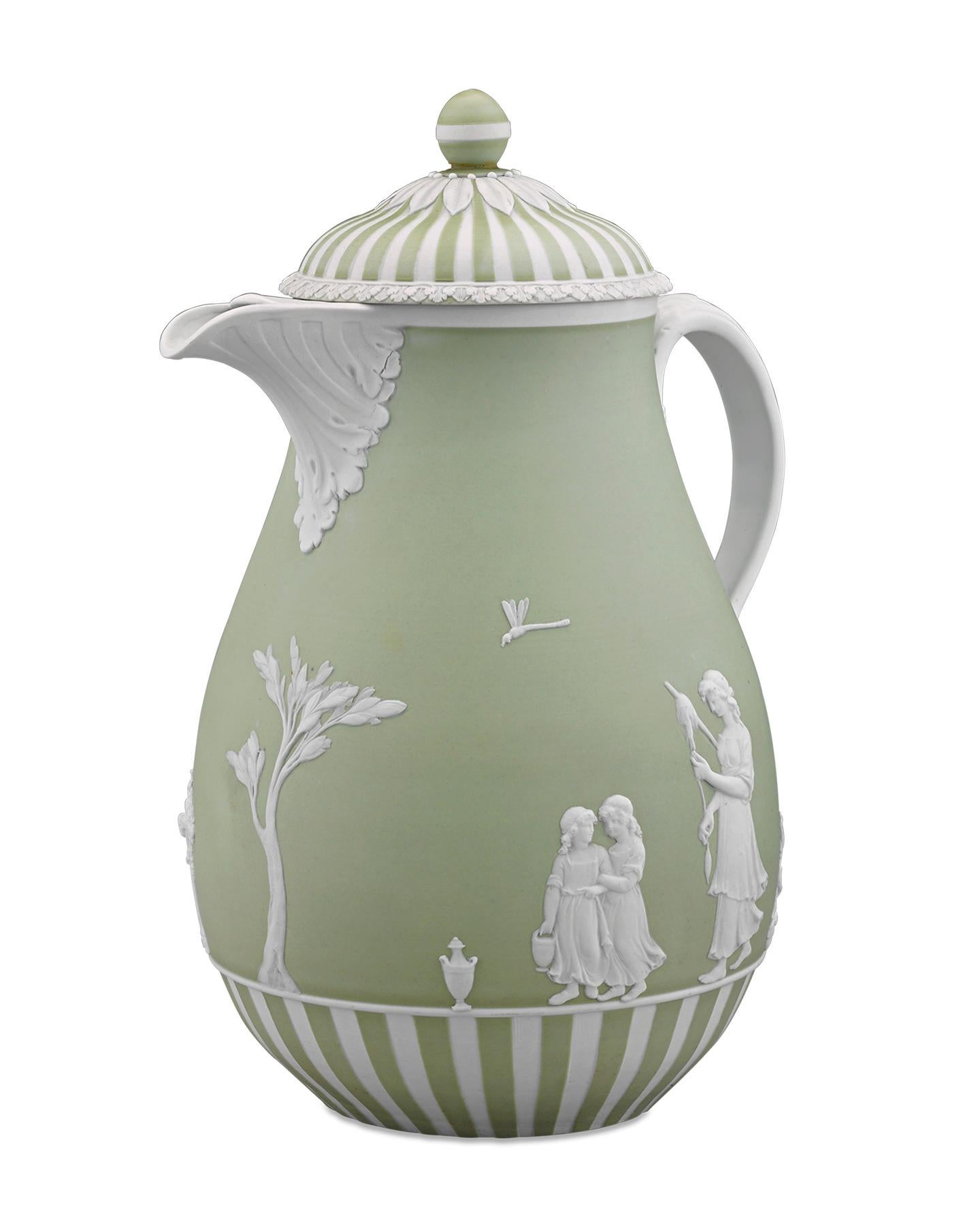 This soft green and white coffee pot by Wedgwood features the rare and highly prized applied relief work of Lady Templeton, the only woman to ever directly collaborate with the creative and business genius Josiah Wedgwood. Exhibiting the dry