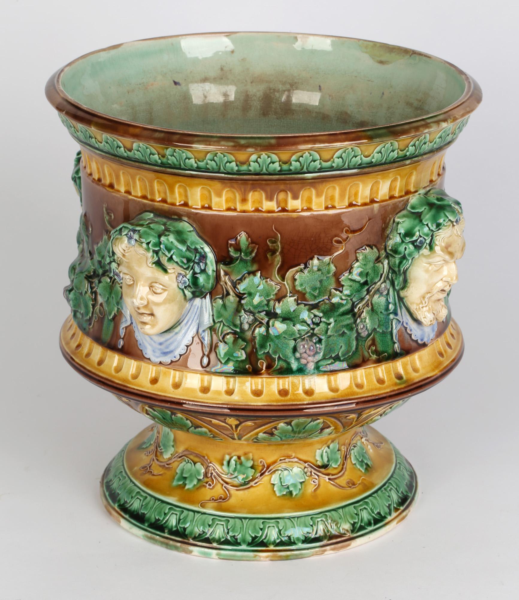 High Victorian Wedgwood Large and Impressive Majolica Jardiniere with Masks and Trailing Vines For Sale