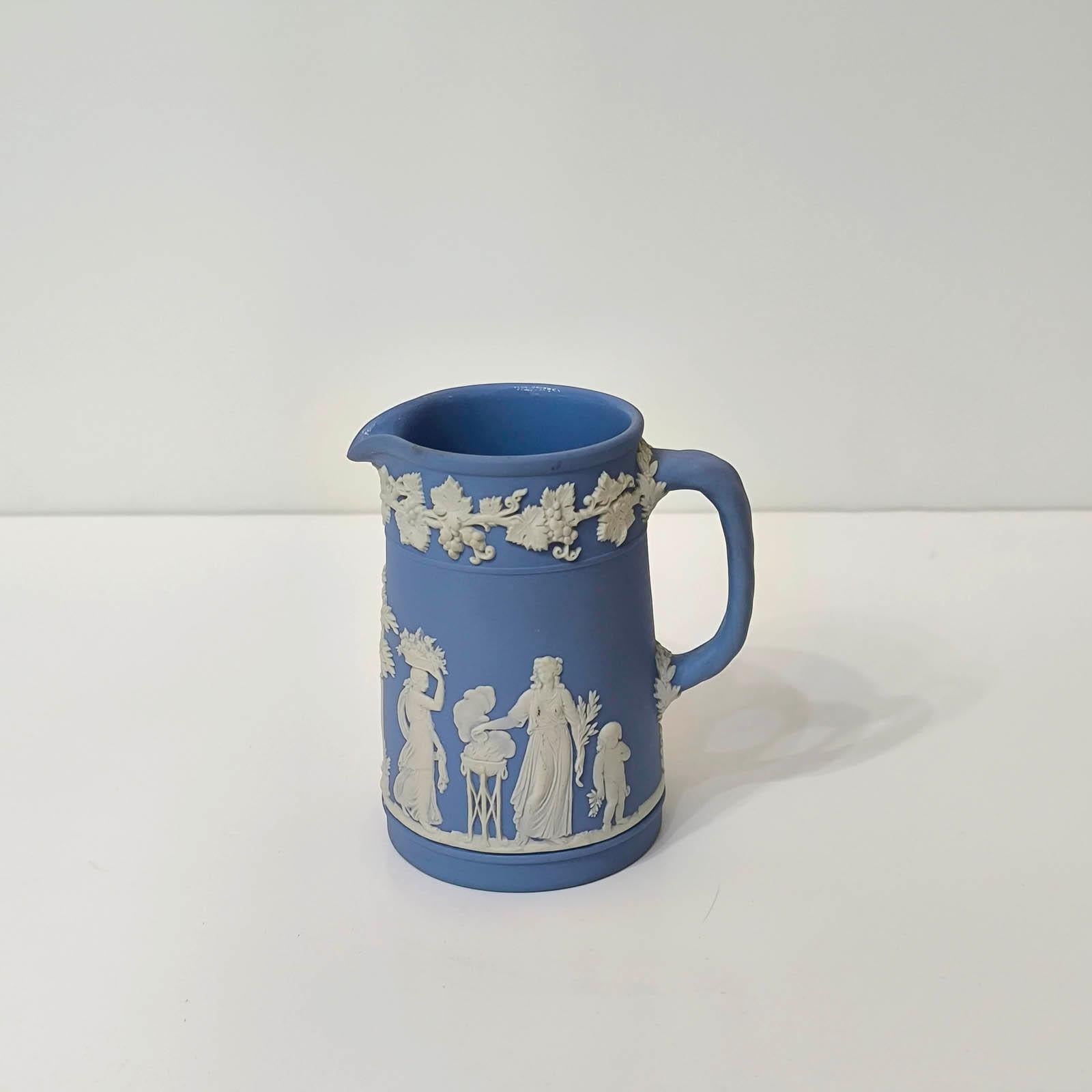 Wedgwood Lavender Blue Jasperware Jug, Vase with Handle.
Signed Wedgwood, Made in England and other marks. Very good overall condition, normal wear. No chips, cracks or crazing and would make a wonderful addition to your collection!