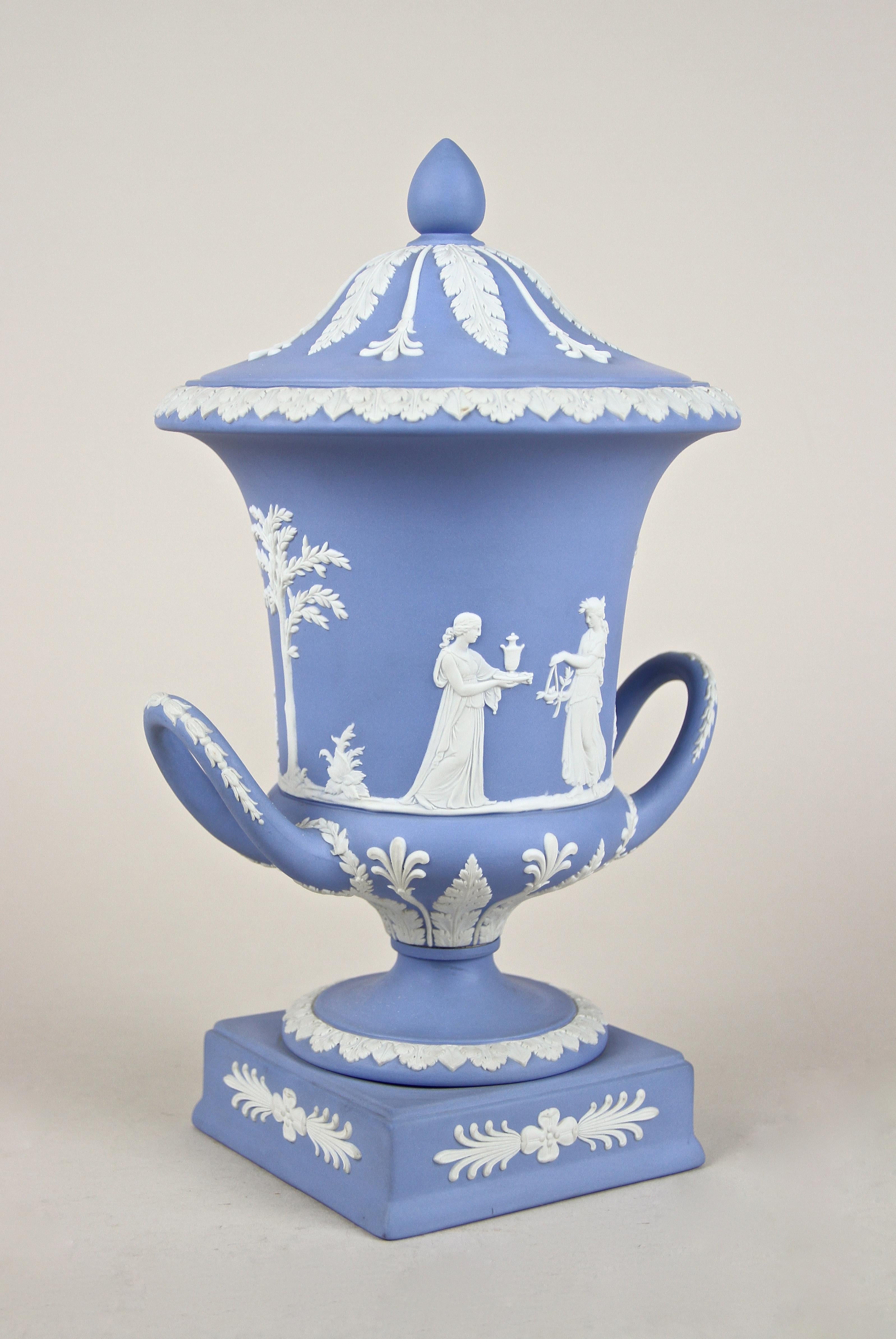 Lovely lidded pale blue Jasperware urn vase from the famous English company of Wedgwood in breathtaking condition. Made in the early 20th century around 1910, this stunning vase comes straight out from the vitrine of a private collector and is in